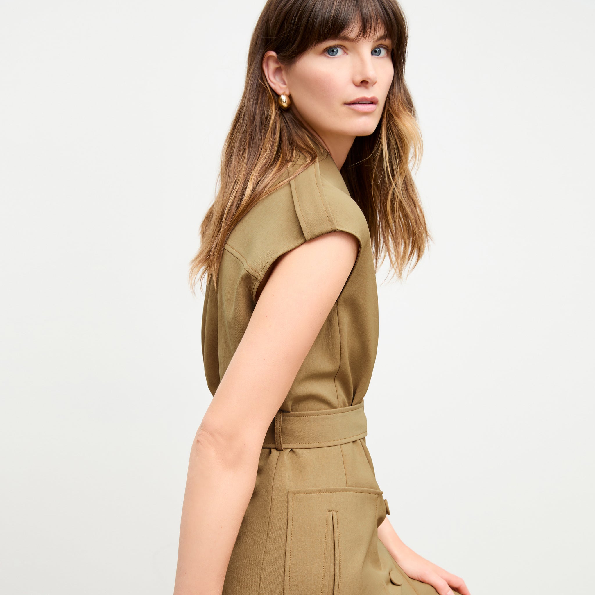side image of a woman wearing the marcella dress in macaroon 