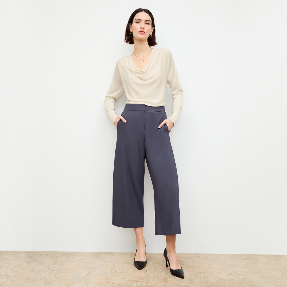 front image of a woman wearing the monica top in cream