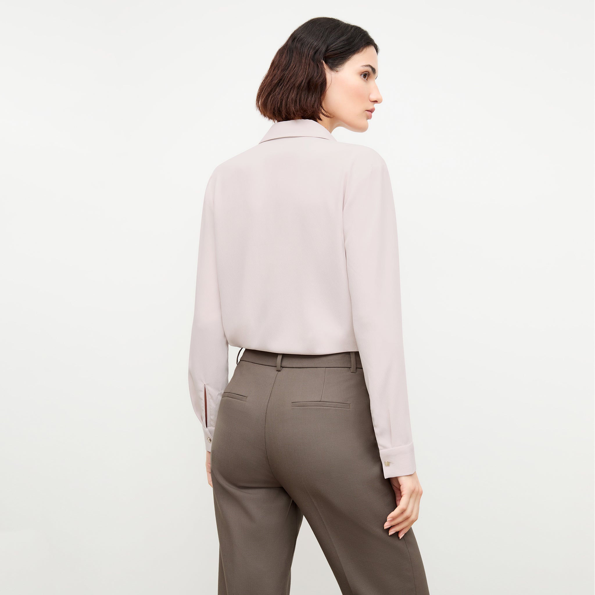back image of a woman wearing the lagarde top in blossom
