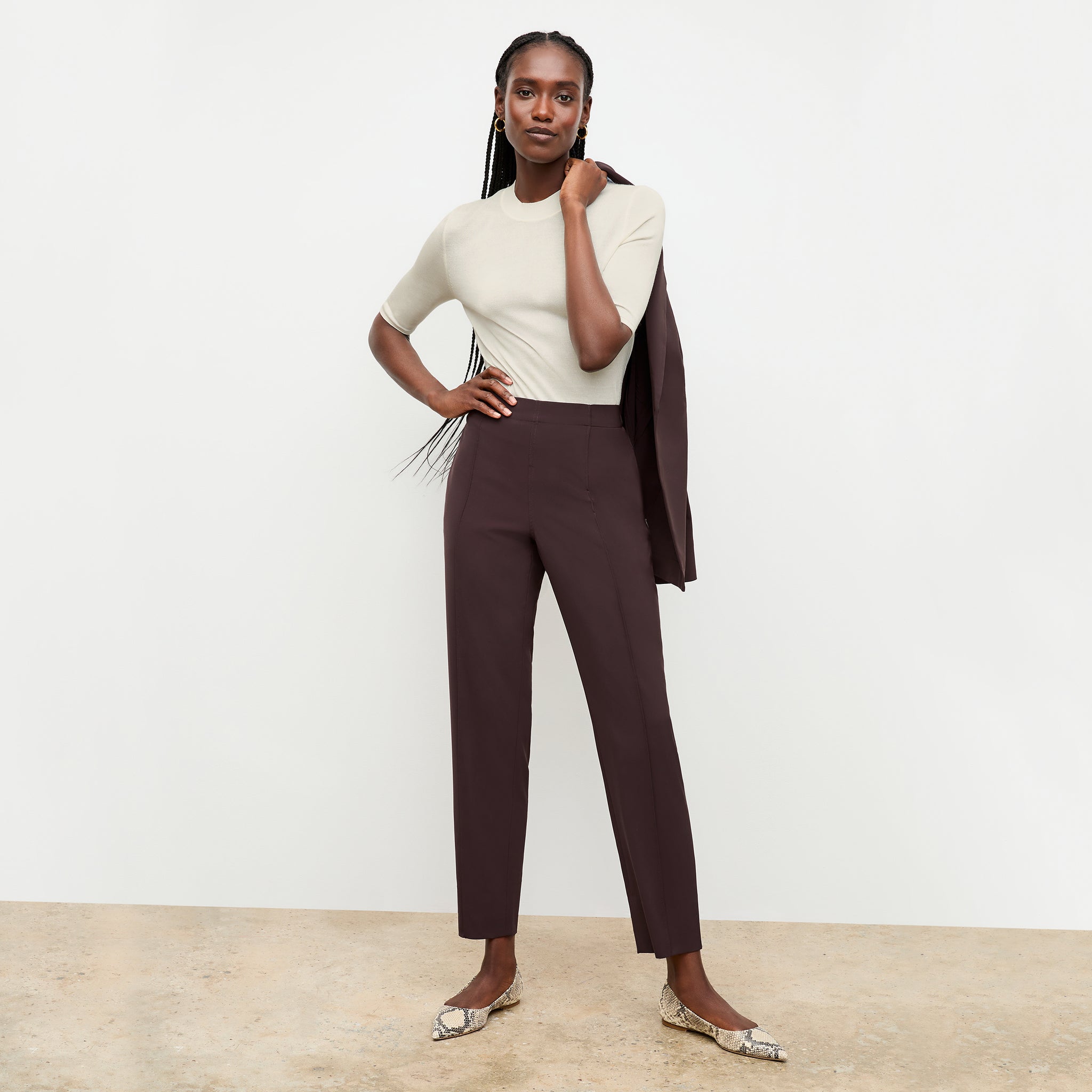 front image of a woman wearing the colby pant in wine 