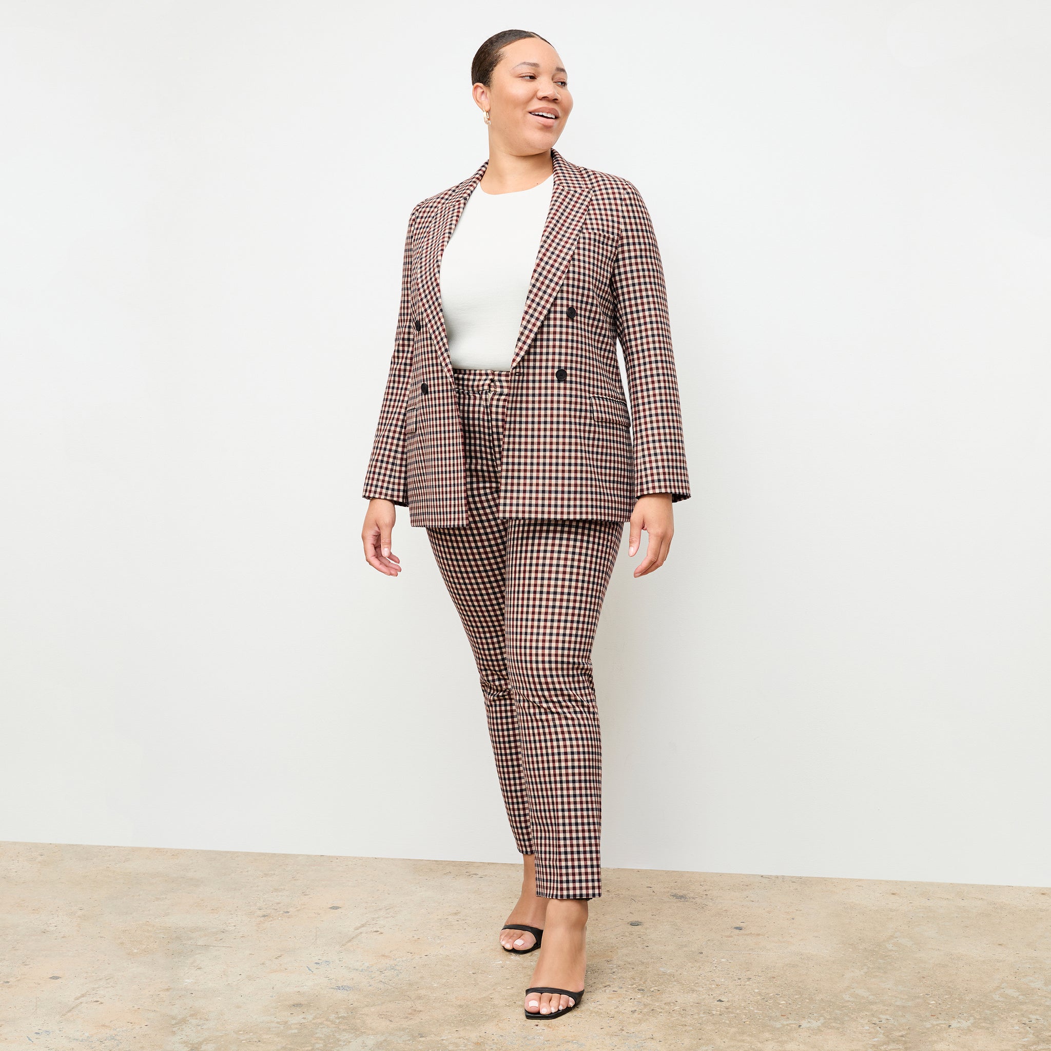 front image of a woman wearing the mejia pant in windowpane 