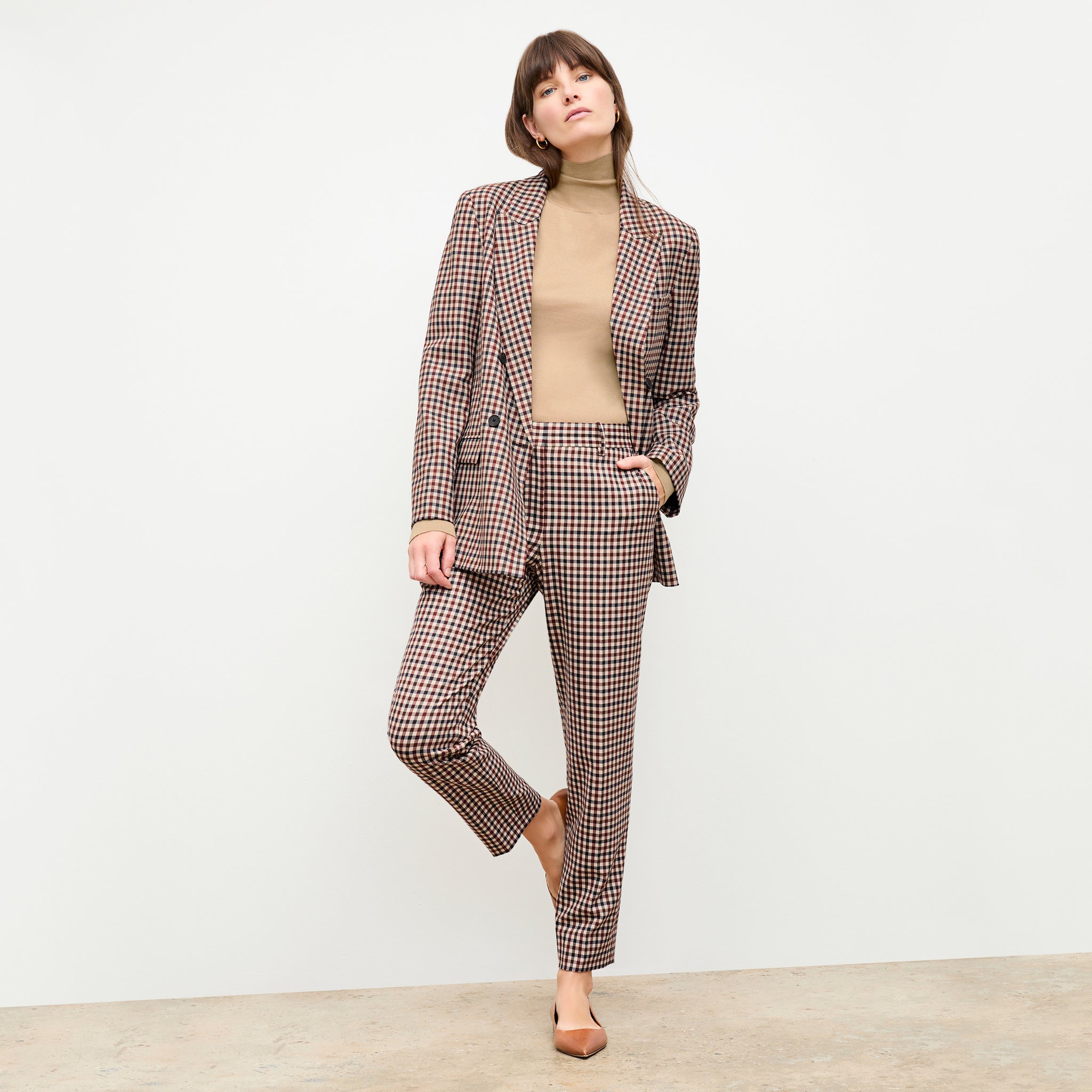 front image of a woman wearing the mejia pant in windowpane 
