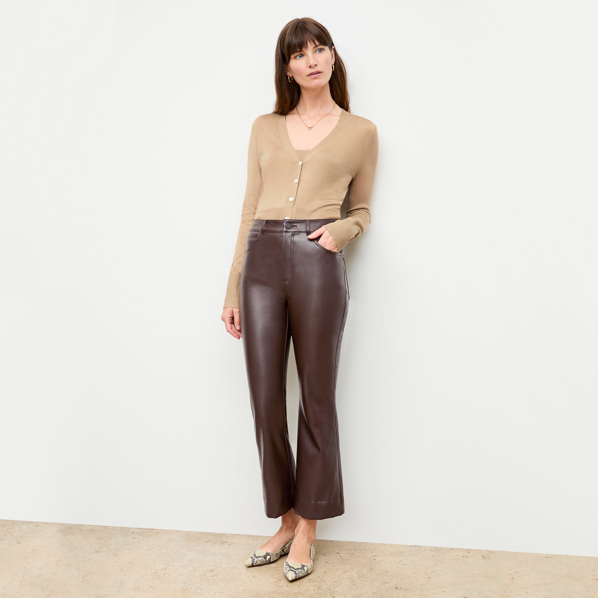 Front image of a woman wearing the archie pant in brown 