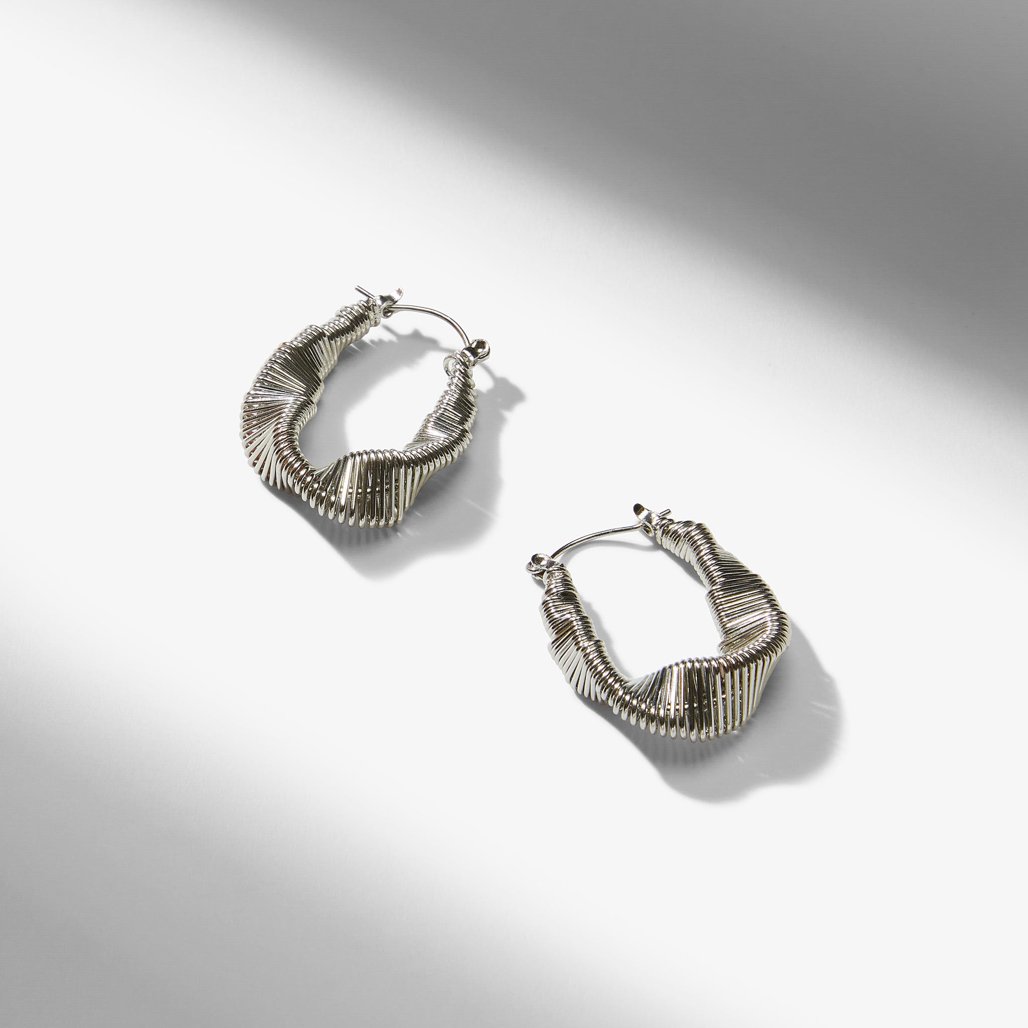 packshot image of the amy earrings in silver 