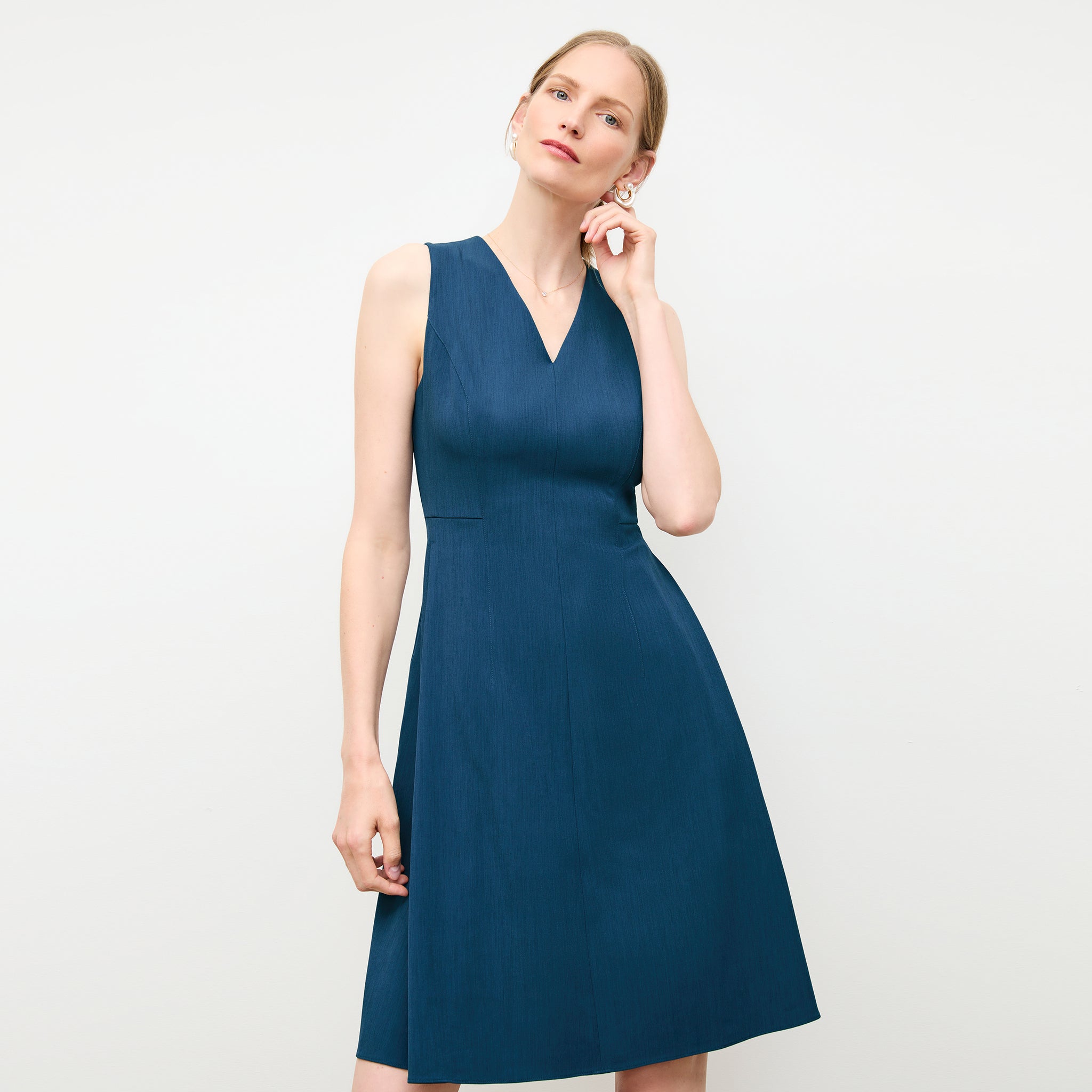 front image of a woman wearing the jaycie dress in deep teal 