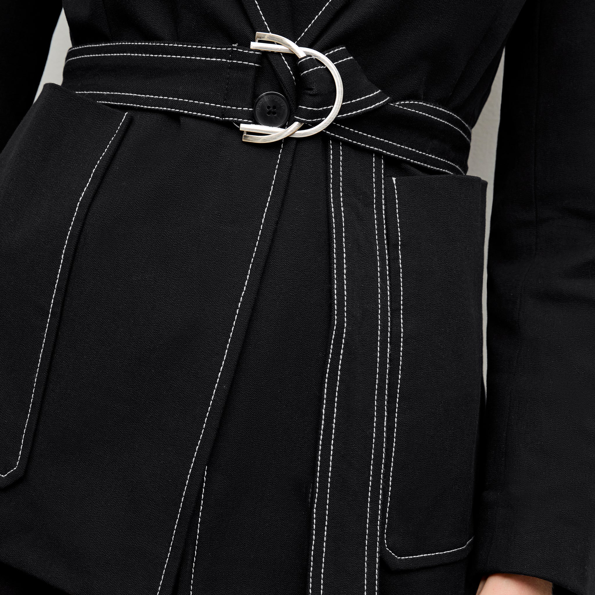 detail image of a woman wearing the grenville jacket in black 