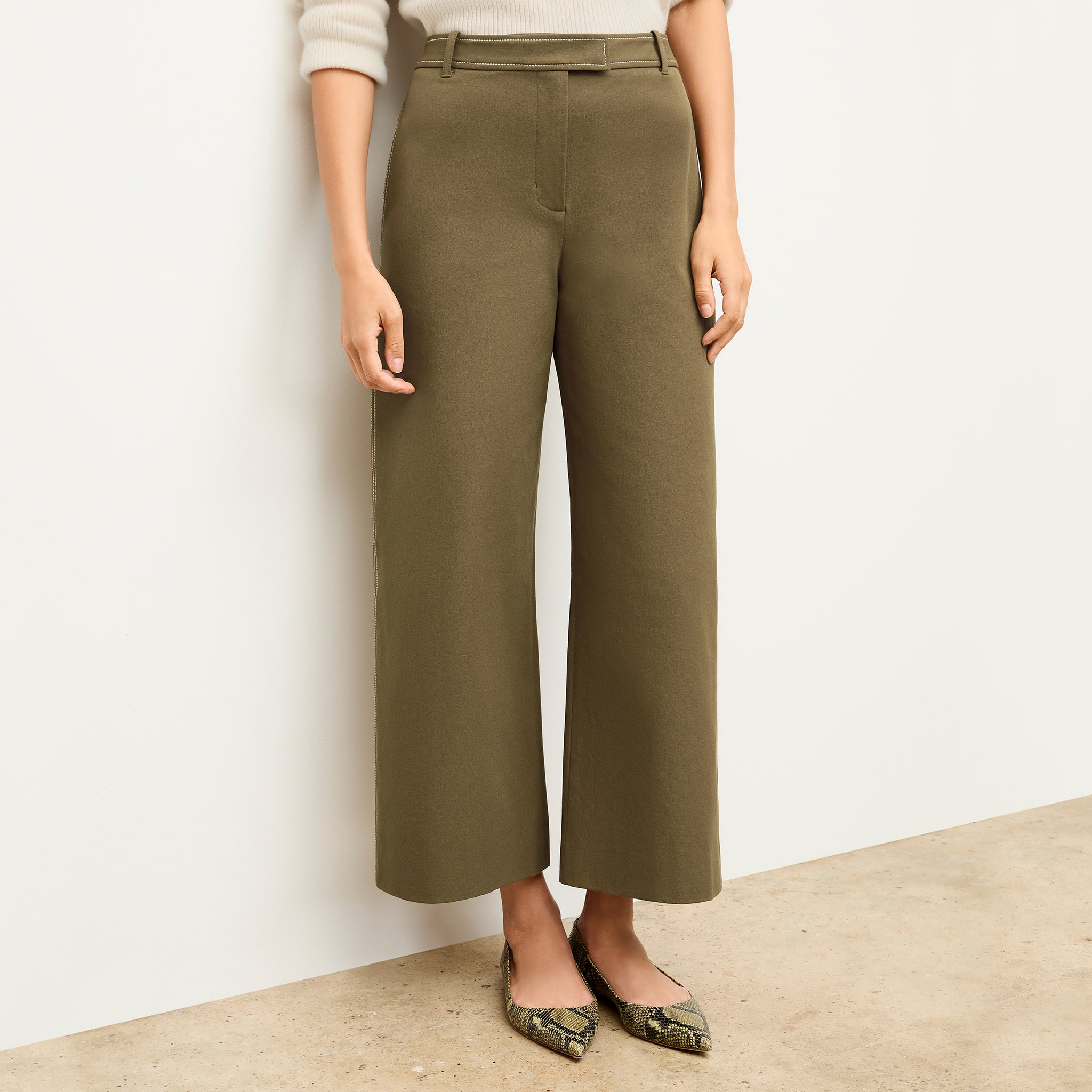 front image of a woman wearing the abby pant in oregano 