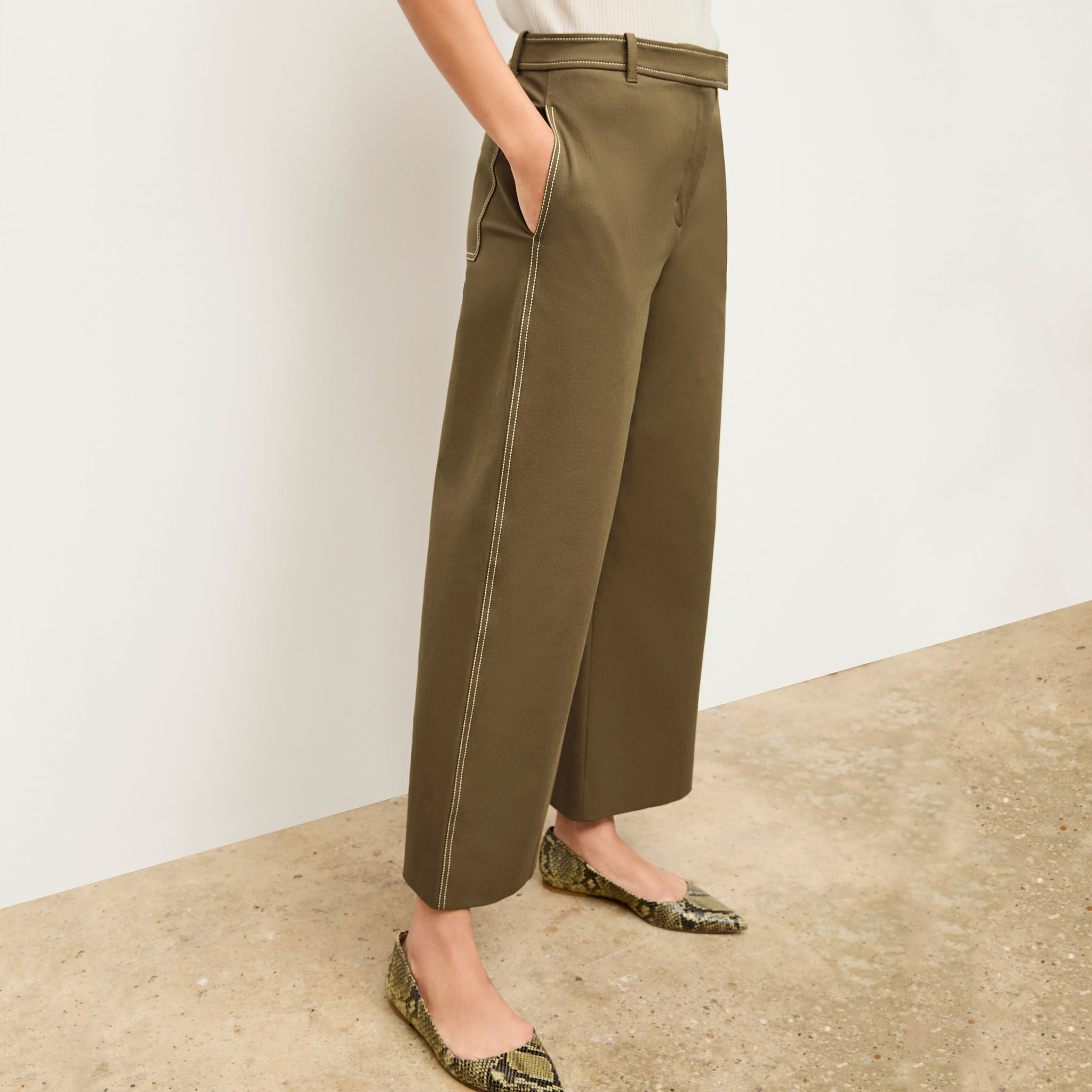 side image of a woman wearing the abby pant in oregano 