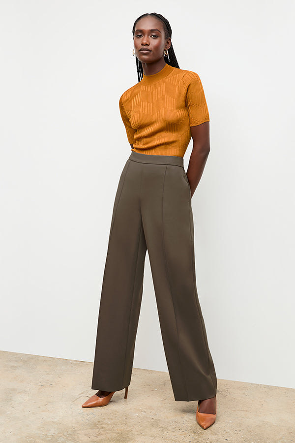 front image of a woman wearing the jordan pant in ash