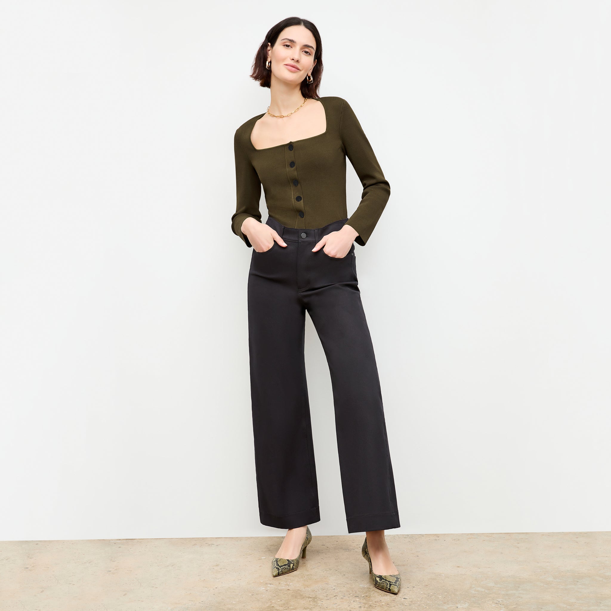 Front image of a woman wearing the Milo Jean in Black