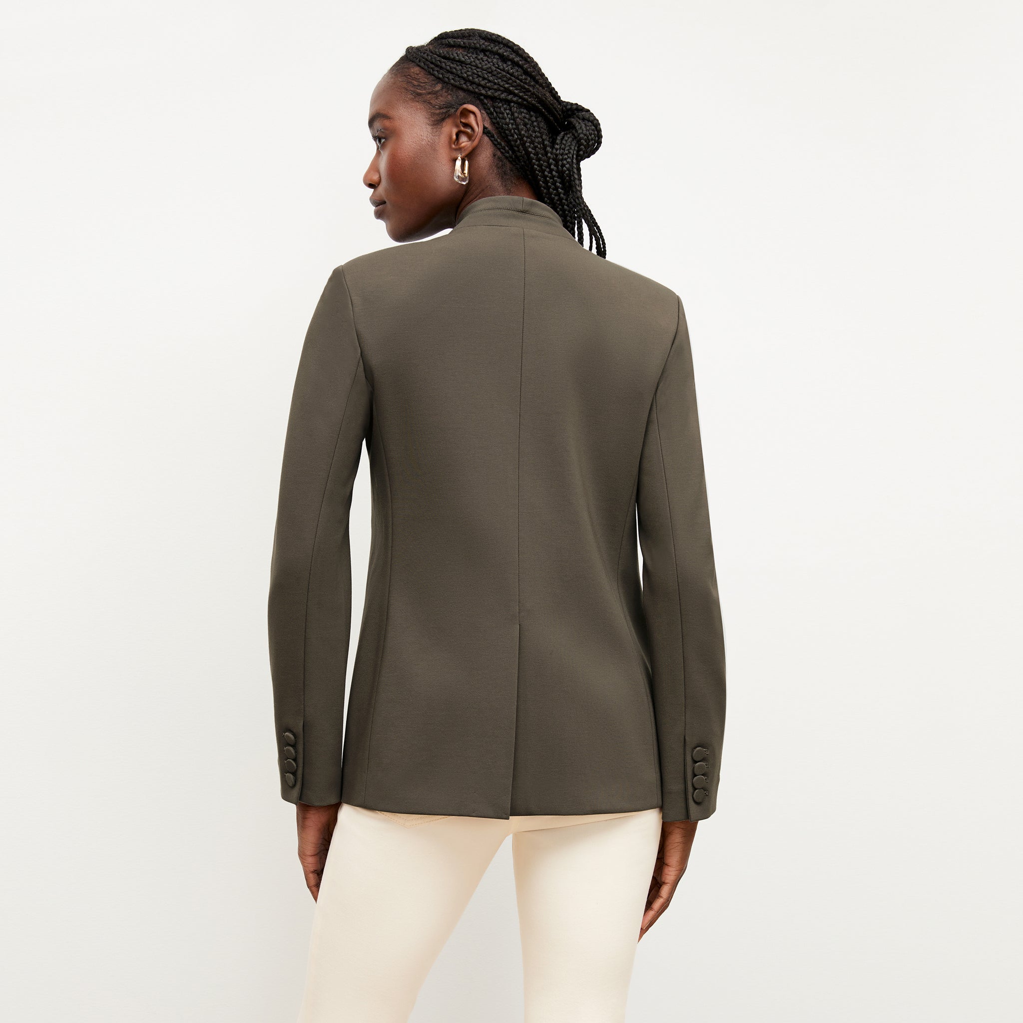 back image of a woman wearing the janette jacket in ash