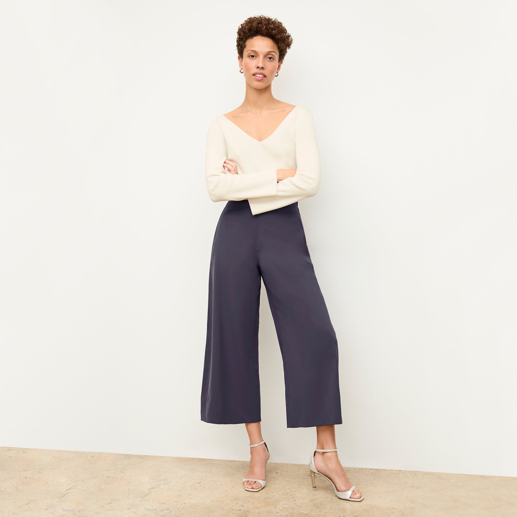 front image of a woman wearing the elena pant in cool charcoal 