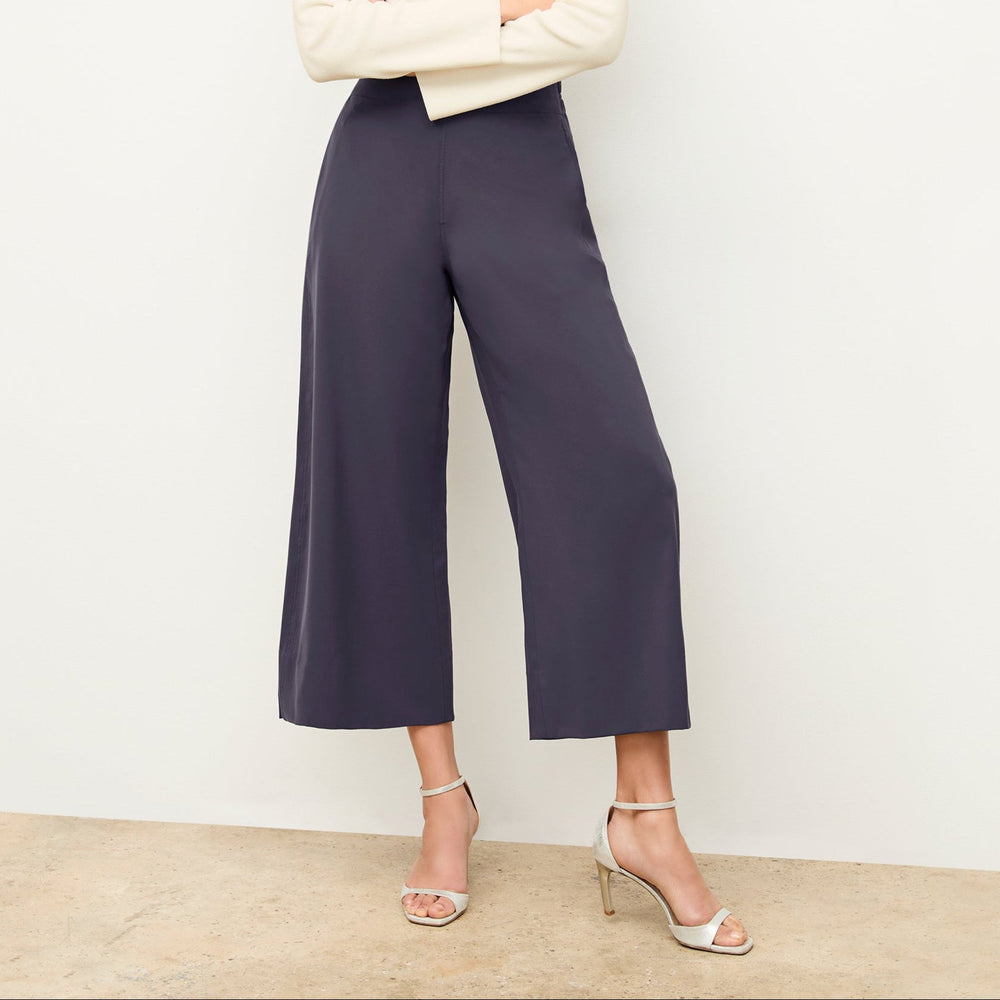 front image of a woman wearing the elena pant in cool charcoal