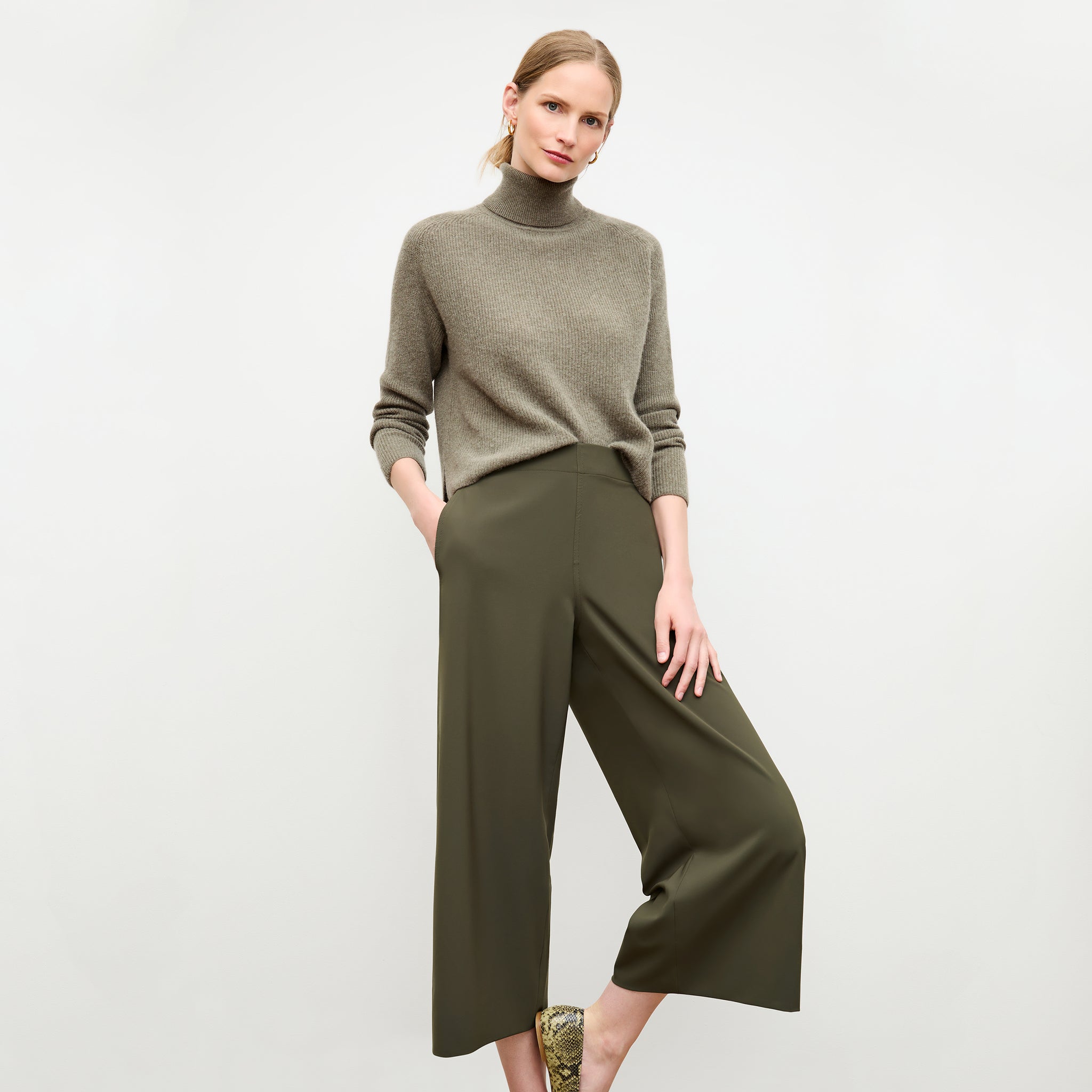 front image of a woman wearing the elena pant in olive 