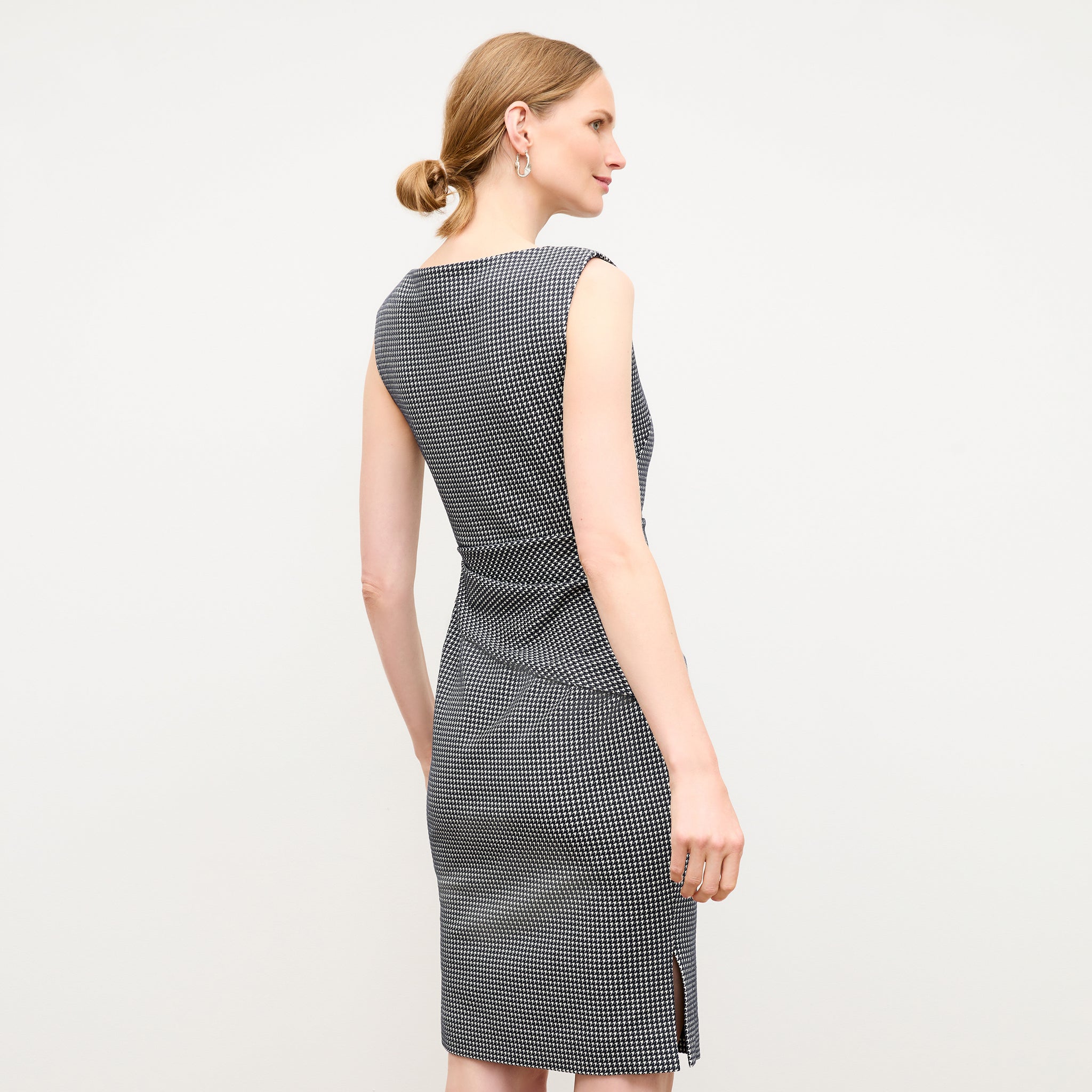 back image of a woman wearing the maisie dress in stretch houndstooth