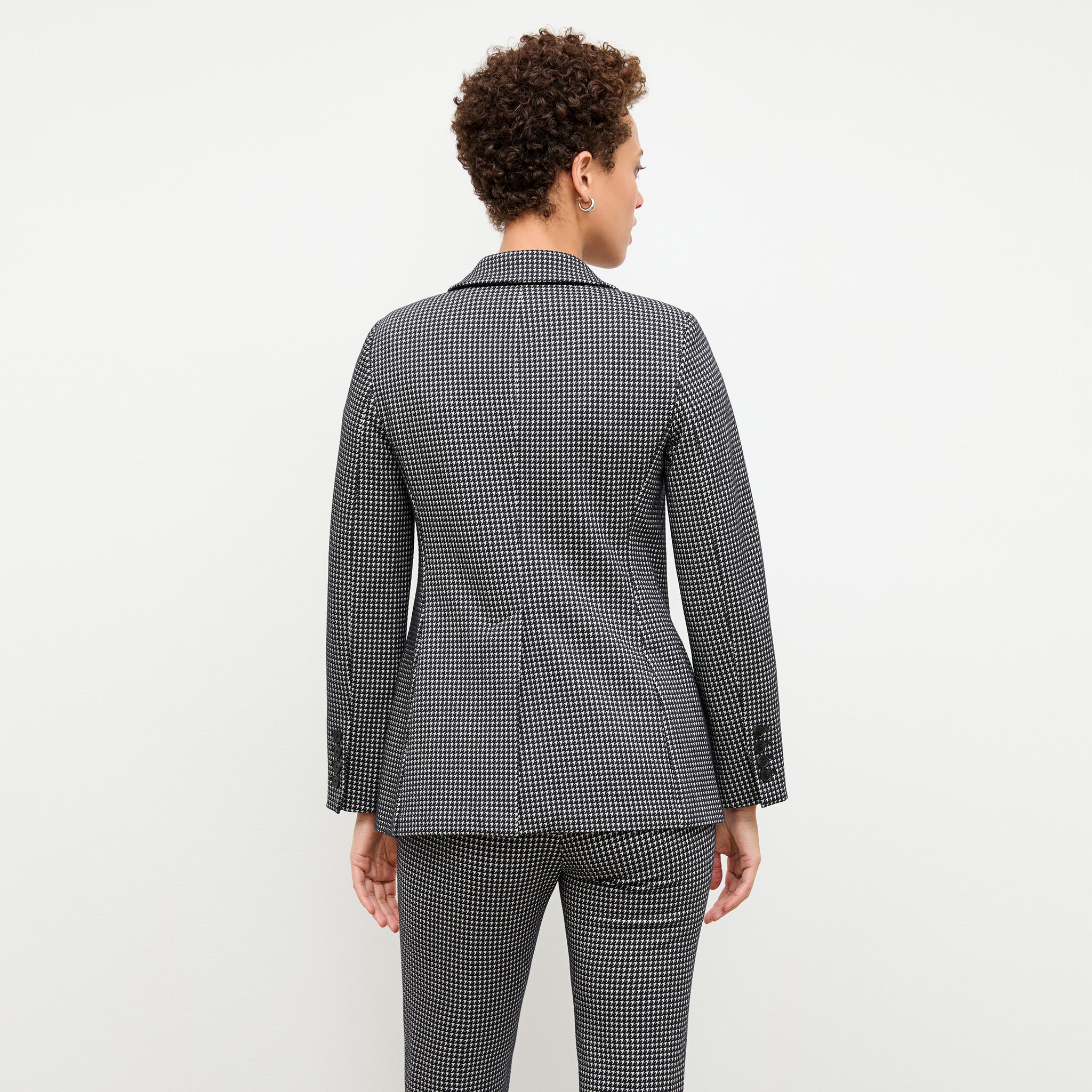 back image of a woman wearing the yiyan jacket in stretch houndstooth