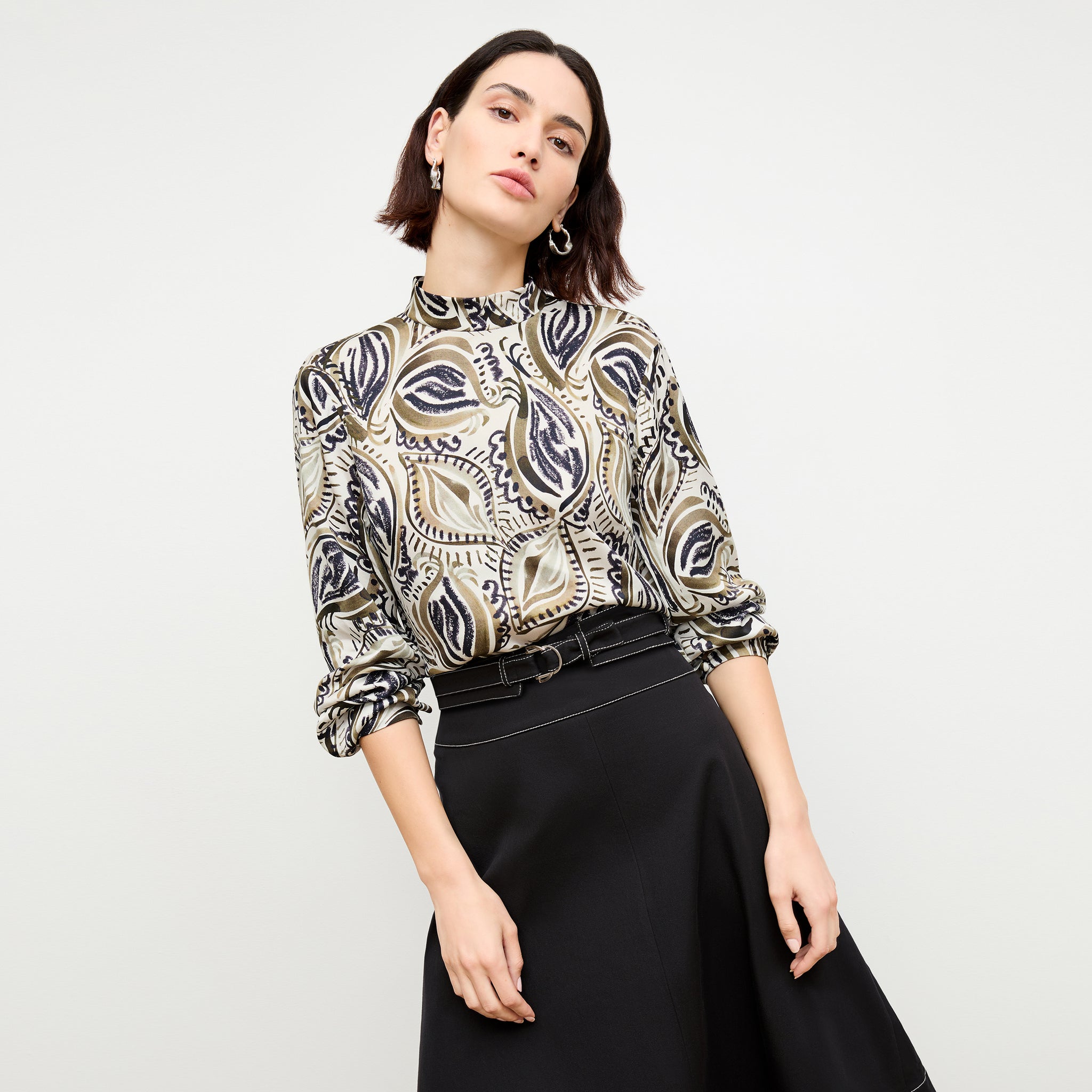 front image of a woman wearing the sohee top in brushstroke paisley 