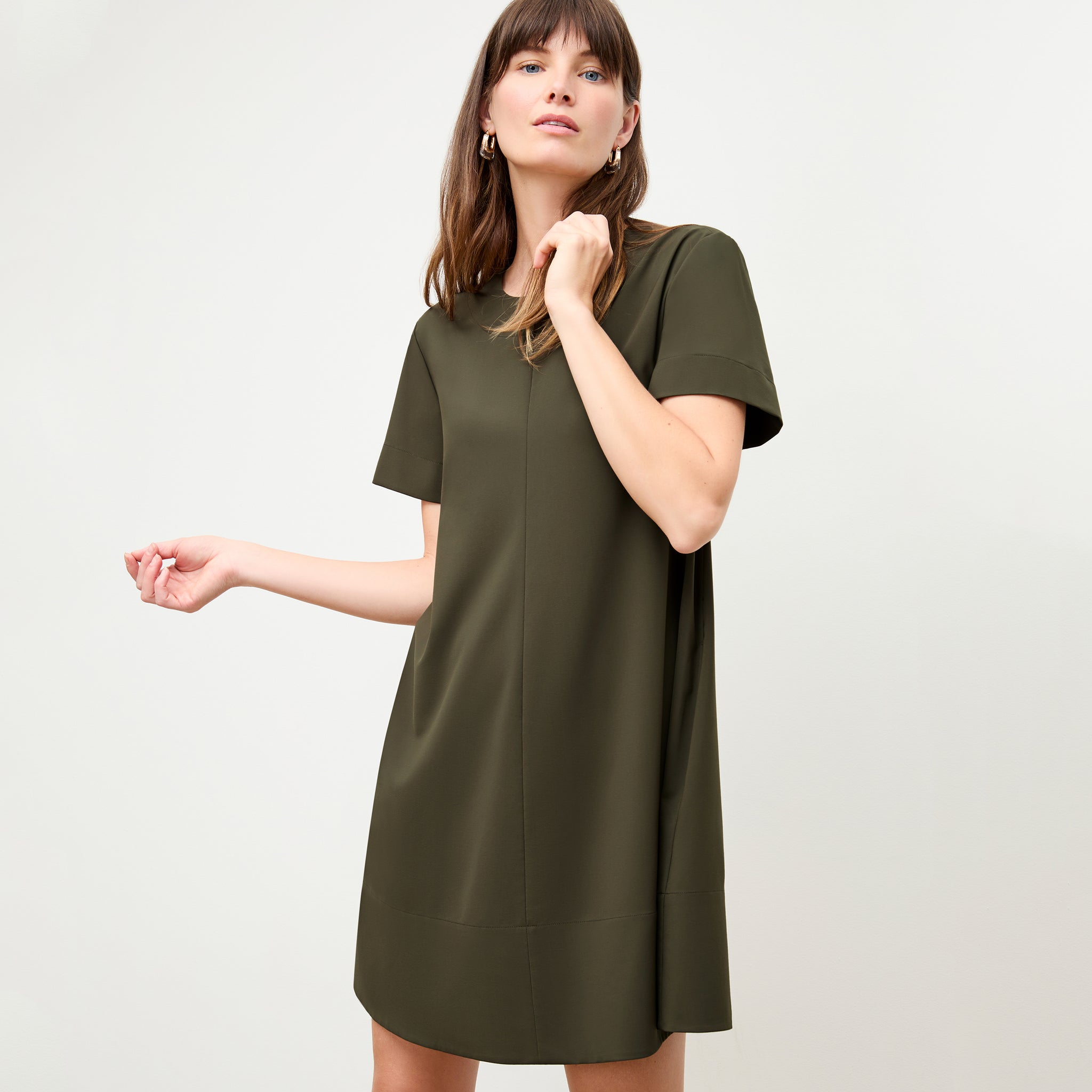 Front image of a woman wearing the Corrie Dress in Olive 