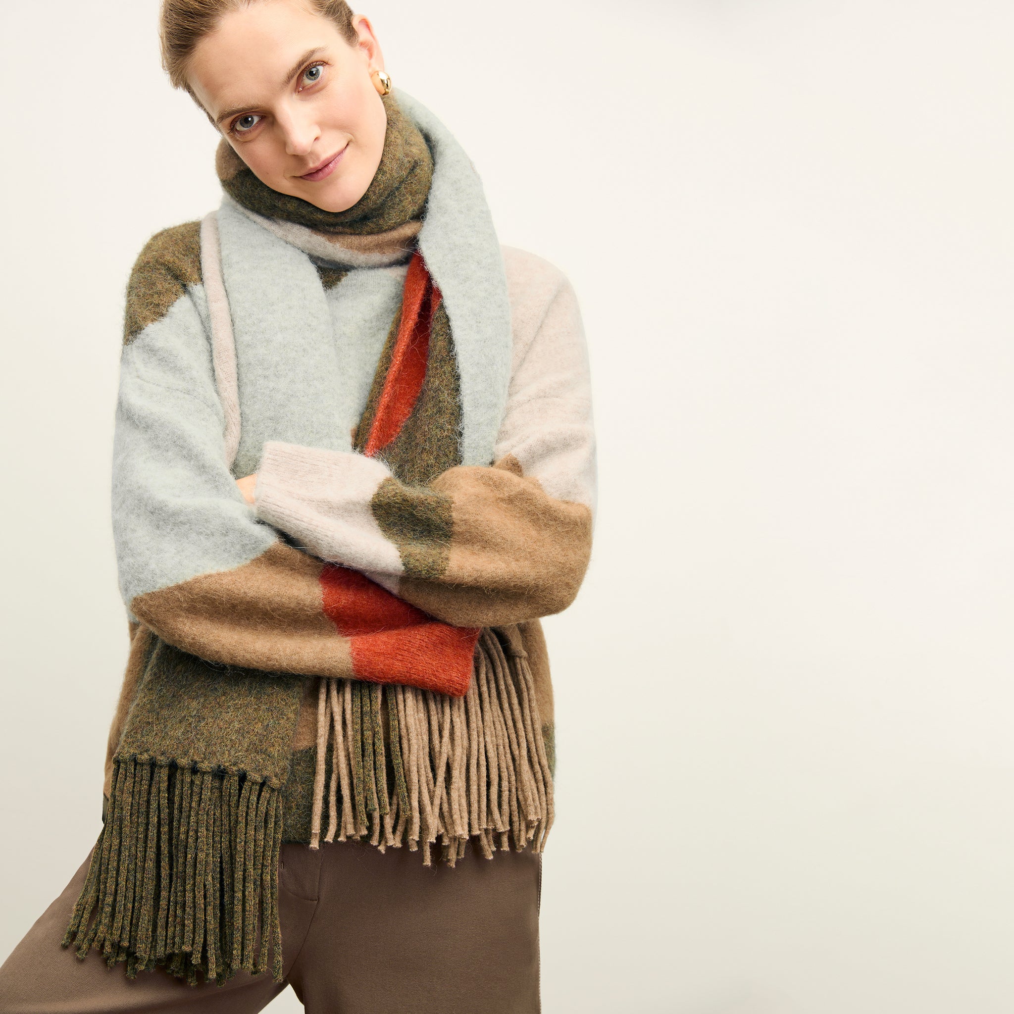 front image of a woman wearing the nash scarf in multi
