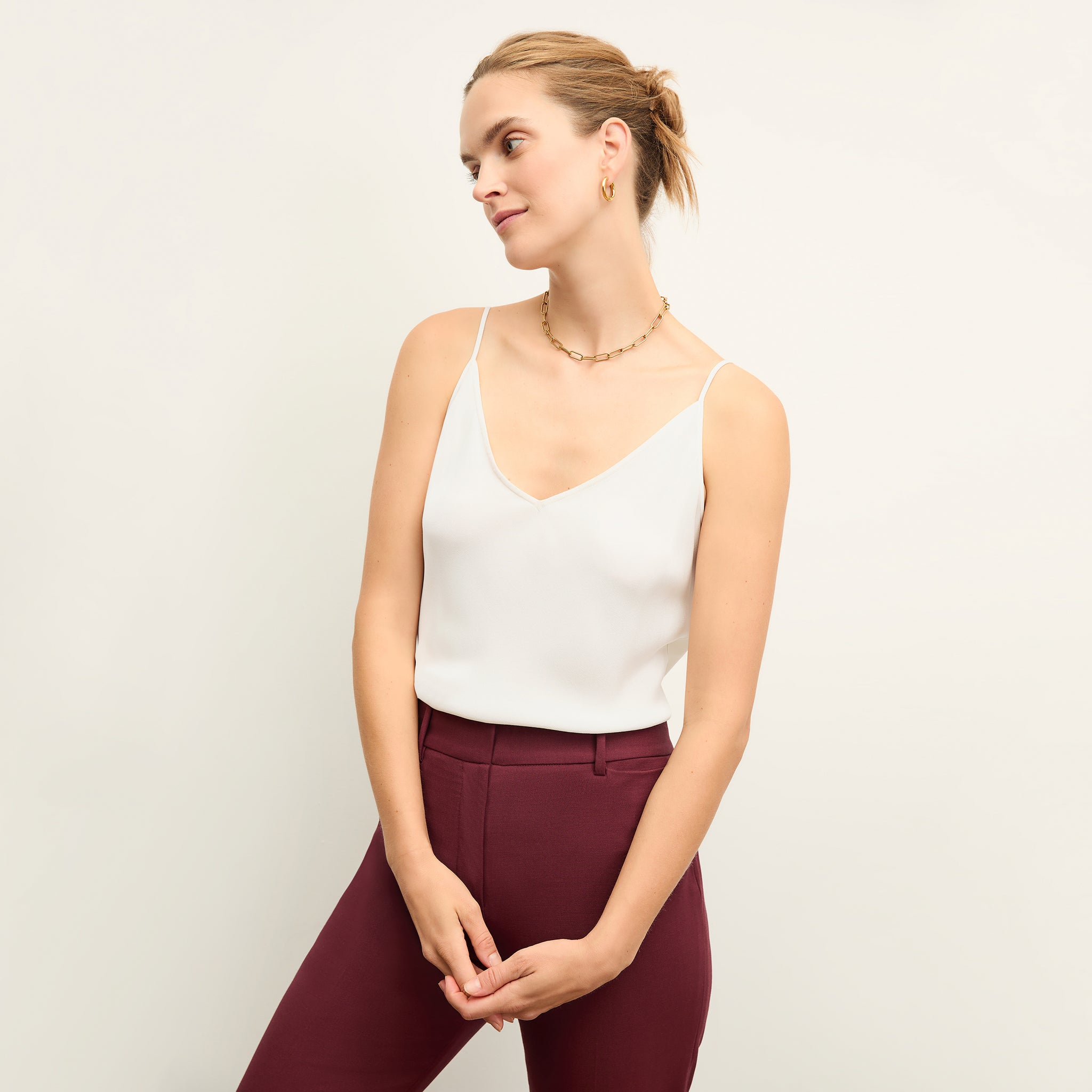 Front image of a woman wearing the Lisey cami in ivory 
