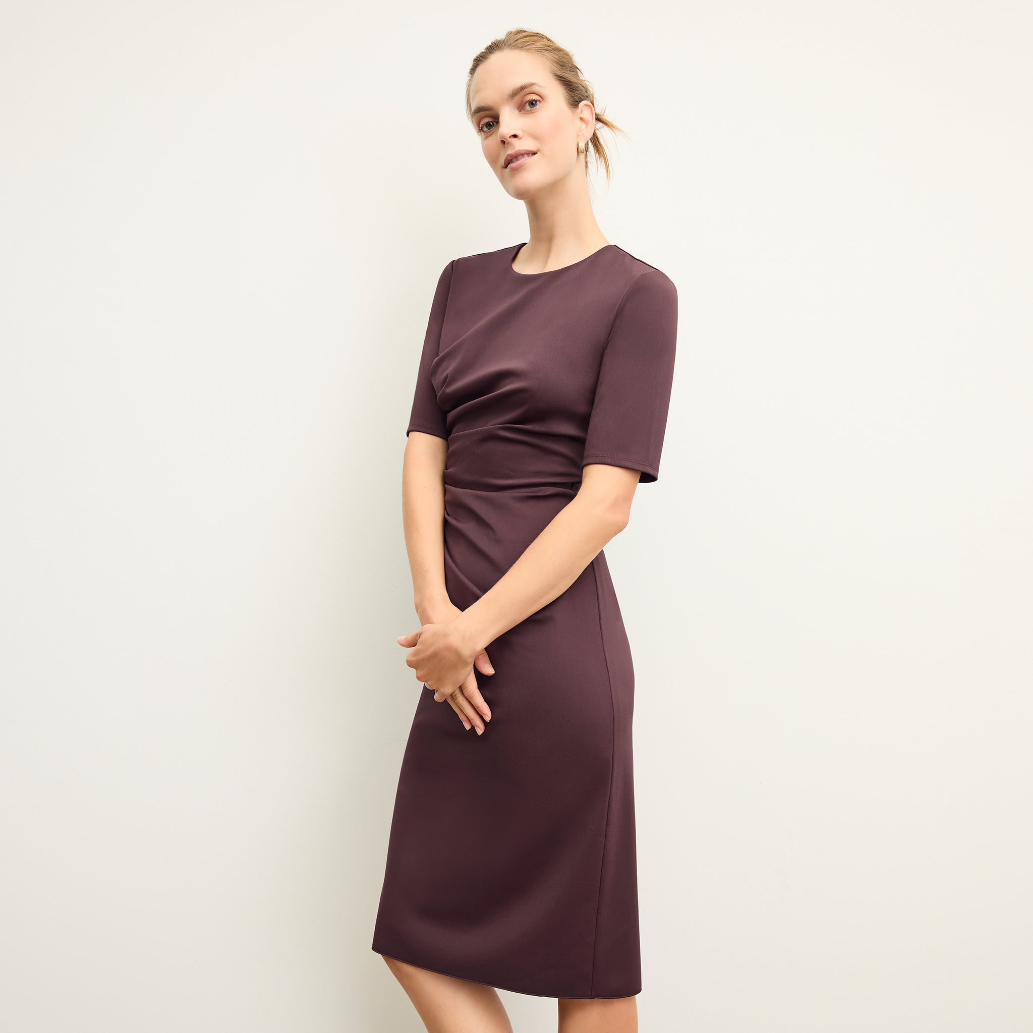 front image of a woman wearing the ciela dress in grape