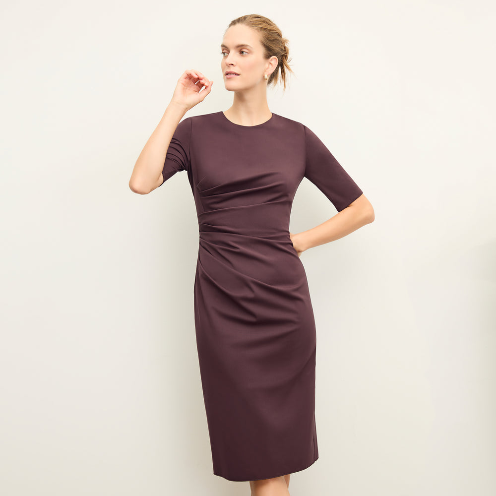 front image of a woman wearing the ciela dress in grape
