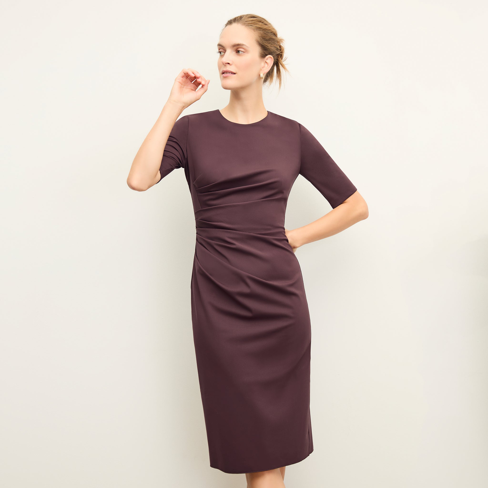 front image of a woman wearing the ciela dress in grape 