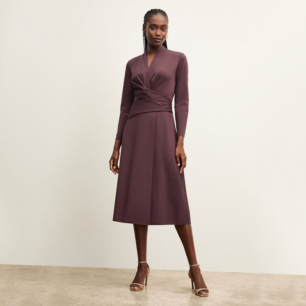 front image of a woman wearing the carly dress in grape