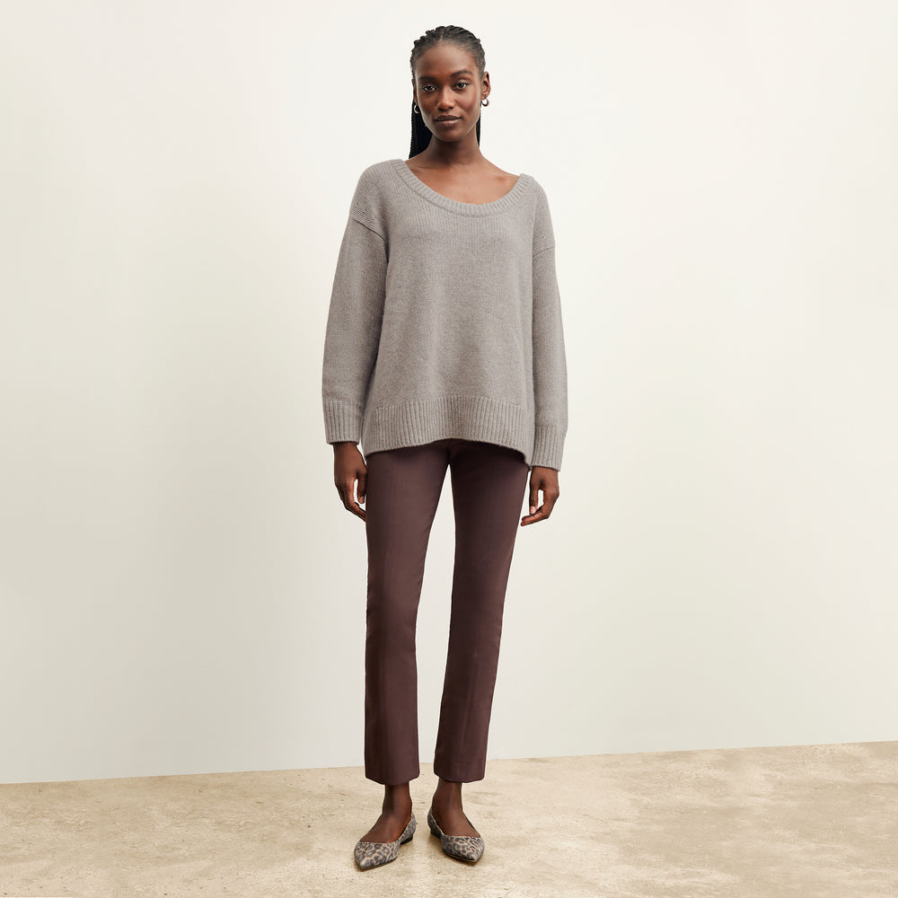 front image of a woman wearing the foster pants in Mahogany