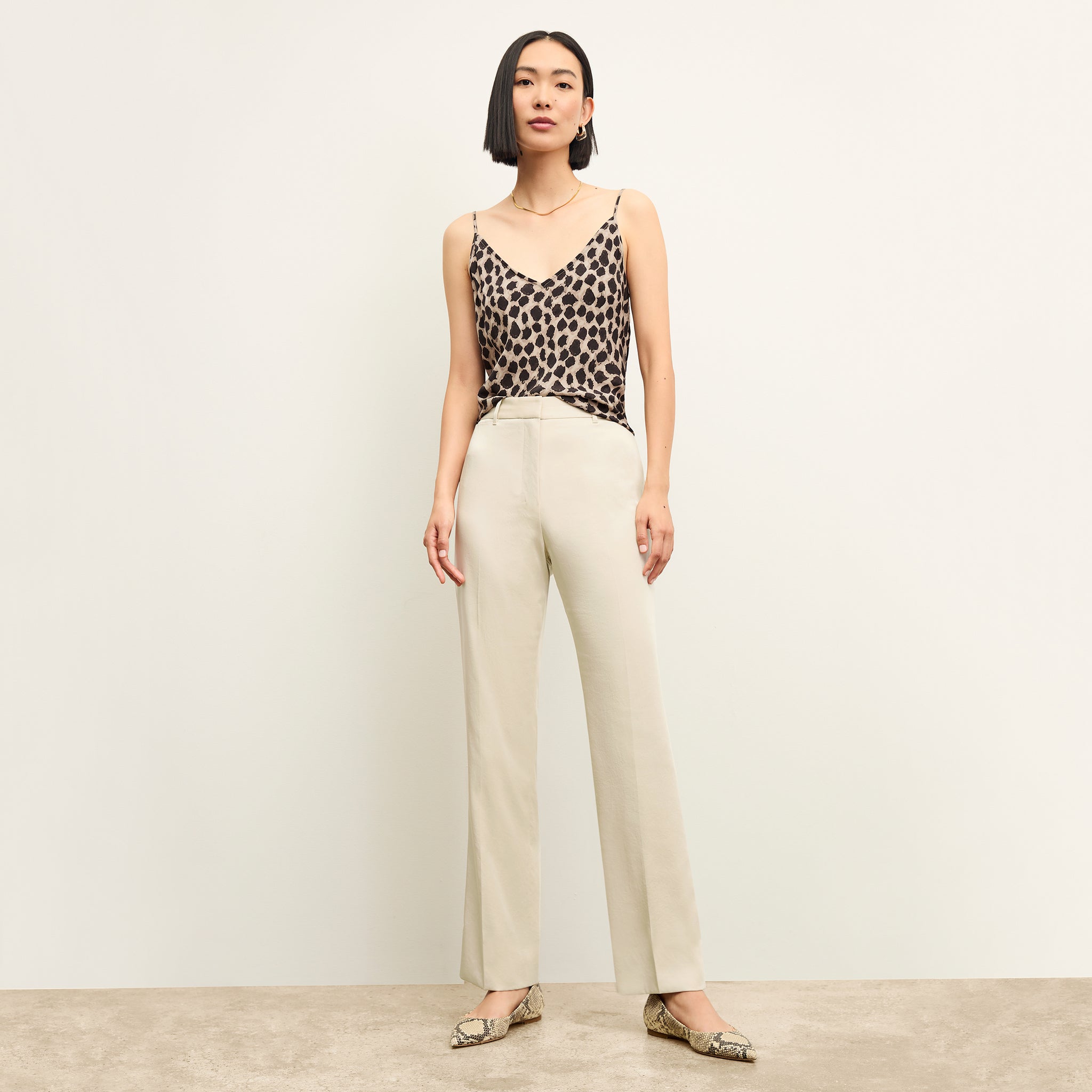 front image of a woman wearing the smith pant in champagne 