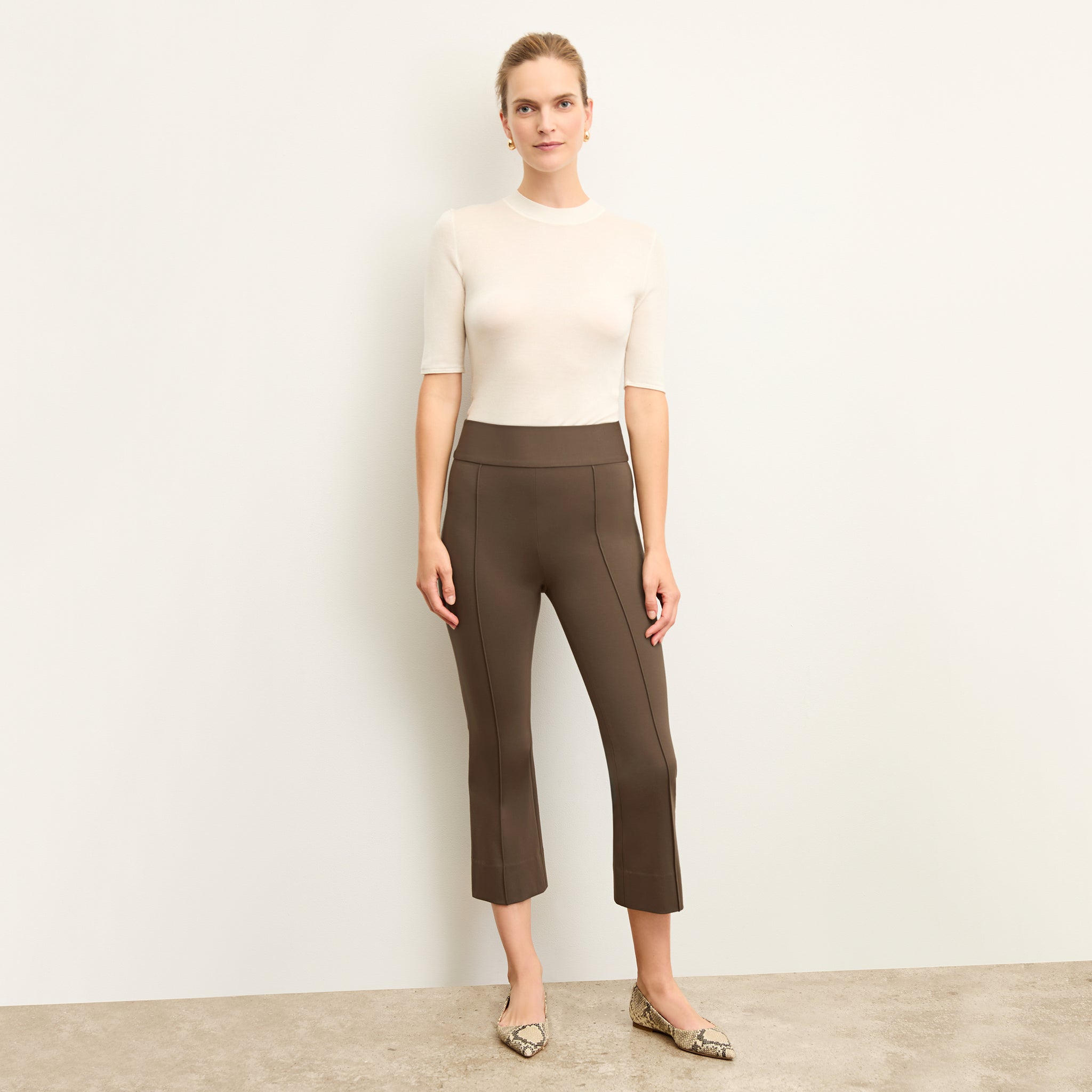 Front image of a woman wearing the allyn pants in ash 