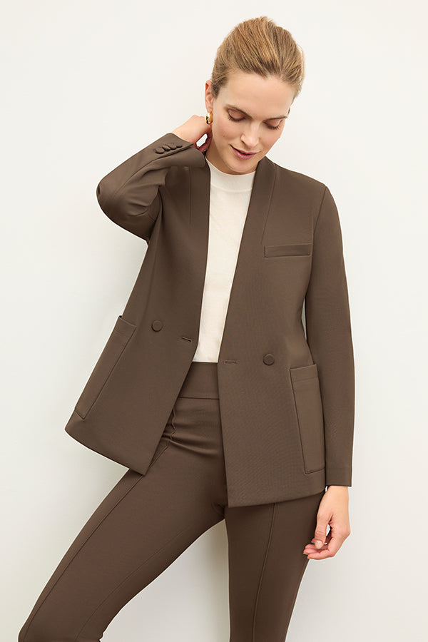 front image of a woman wearing the janette jacket in ash