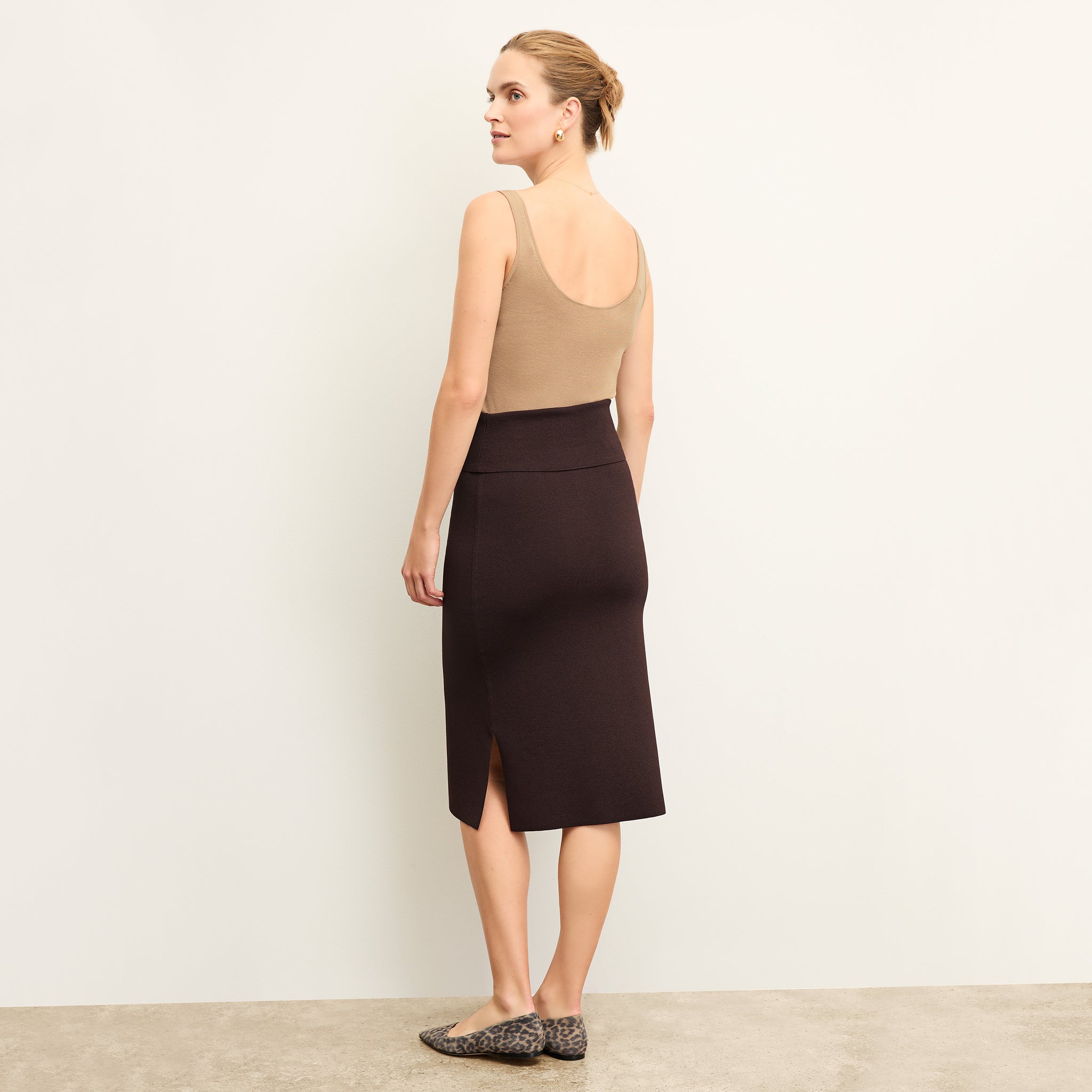 back image of a woman wearing the Harlem Skirt in Chocolate