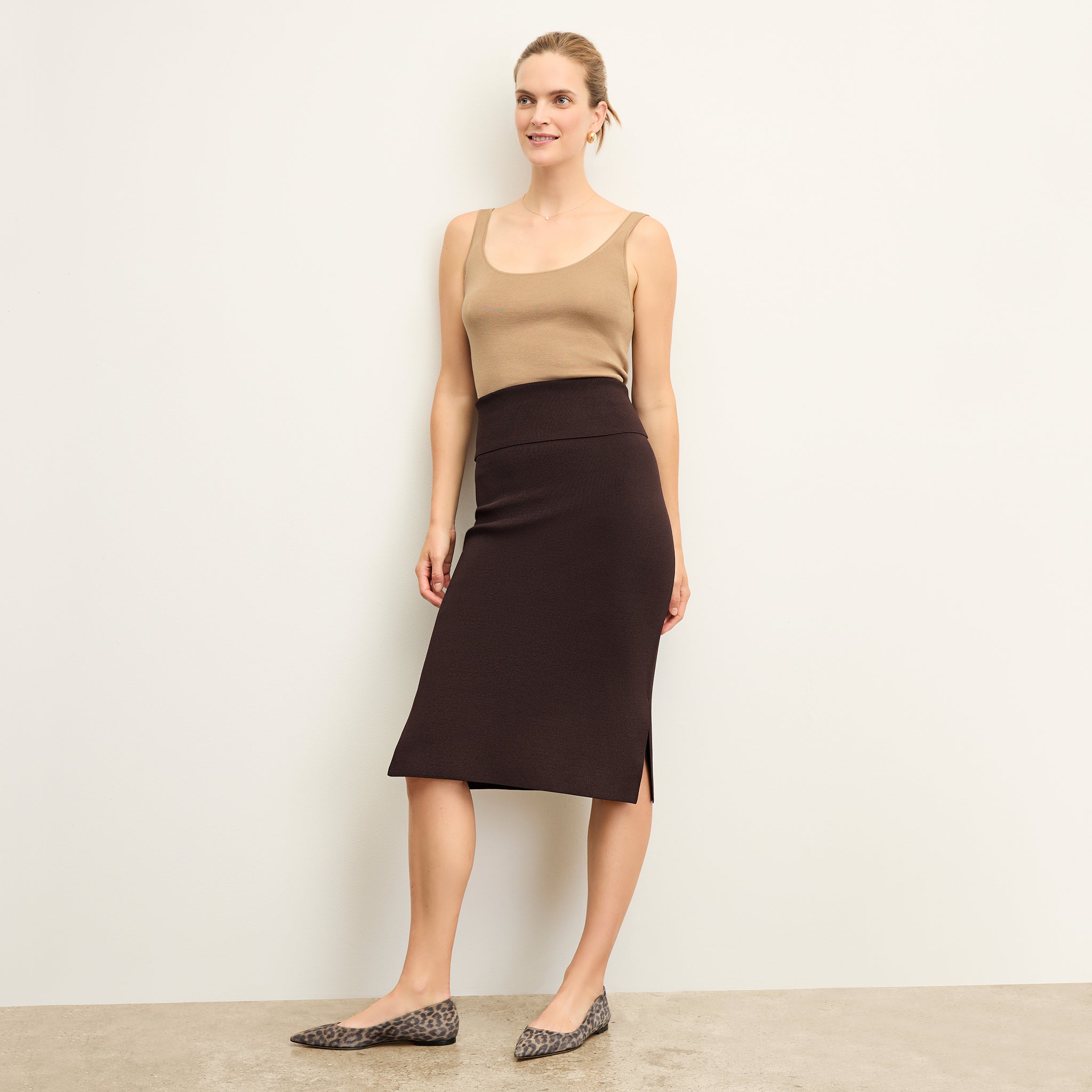 front image of a woman wearing the Harlem Skirt in Chocolate