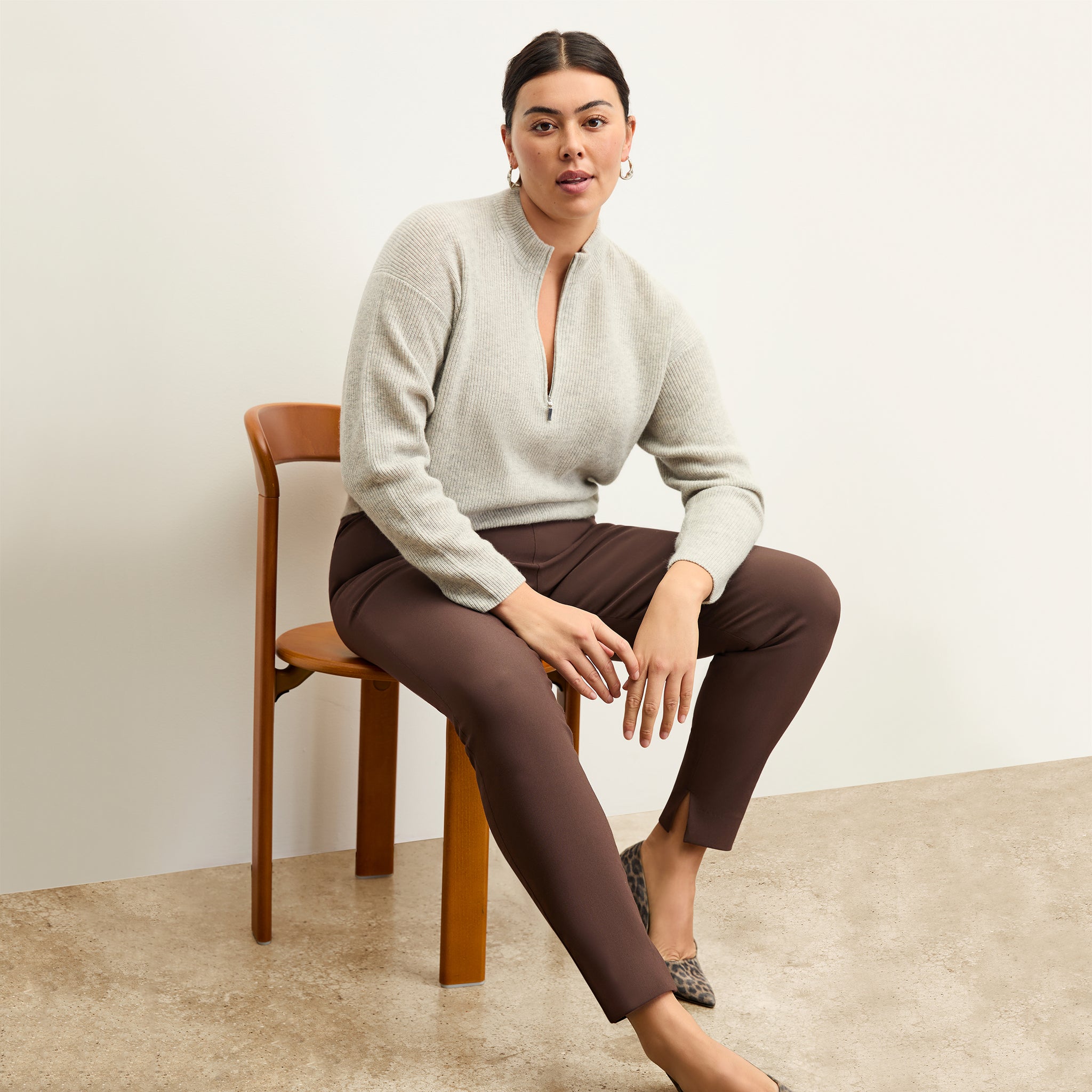 front image of a woman wearing the skinny foster pants in Mahogany 