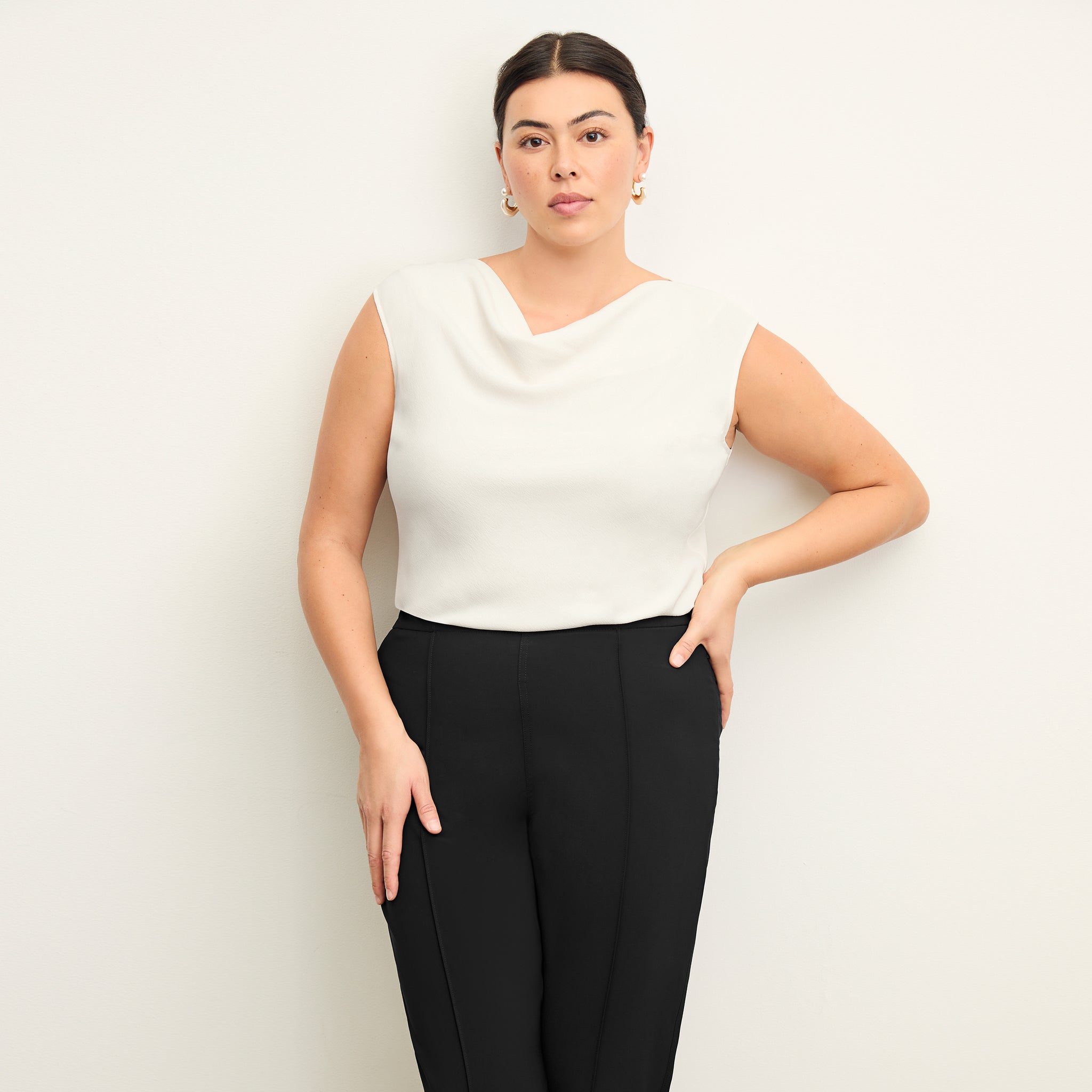 Front image of a woman wearing the Nora Top in Alabaster 