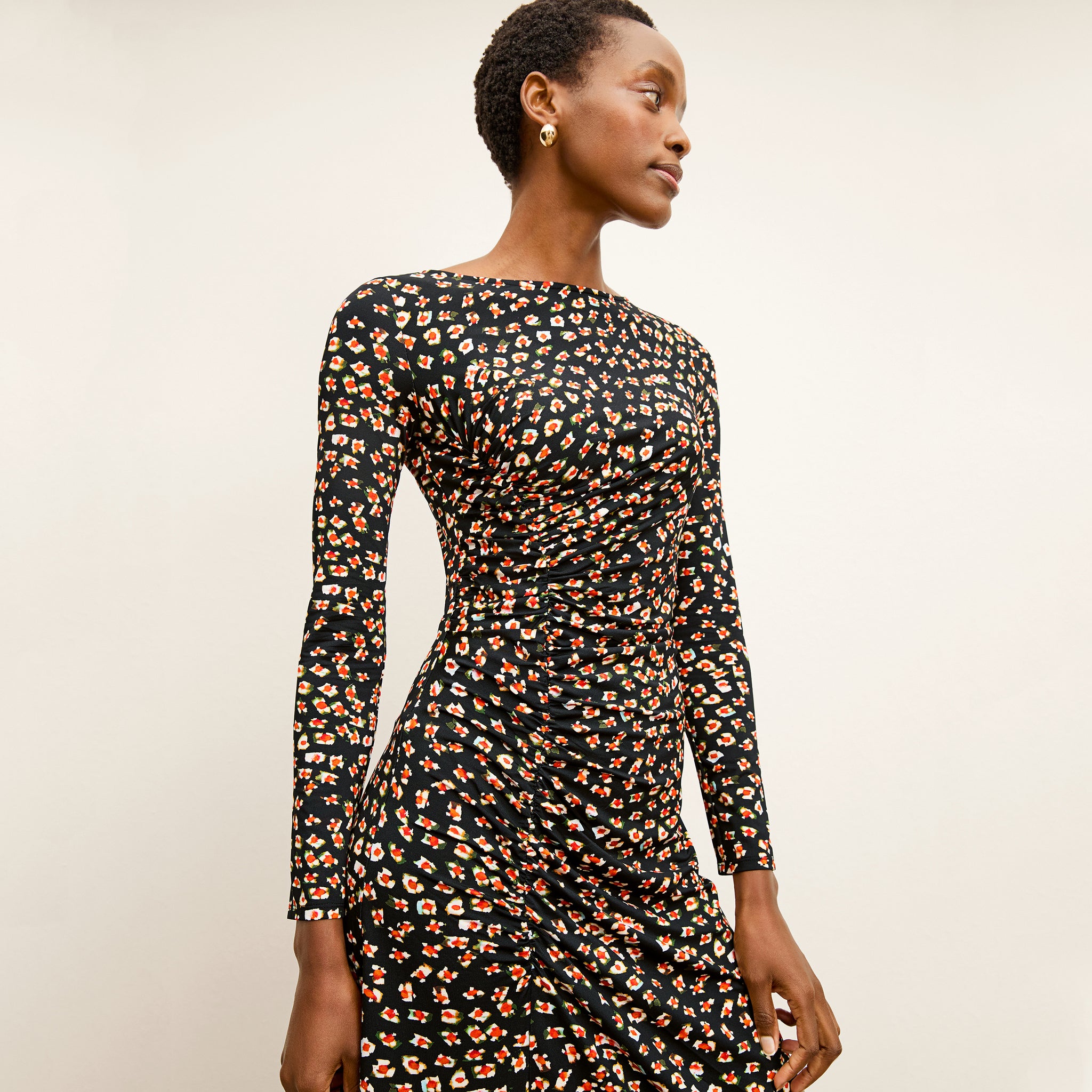 front image of a woman wearing the rani dress in kaleidoscope print