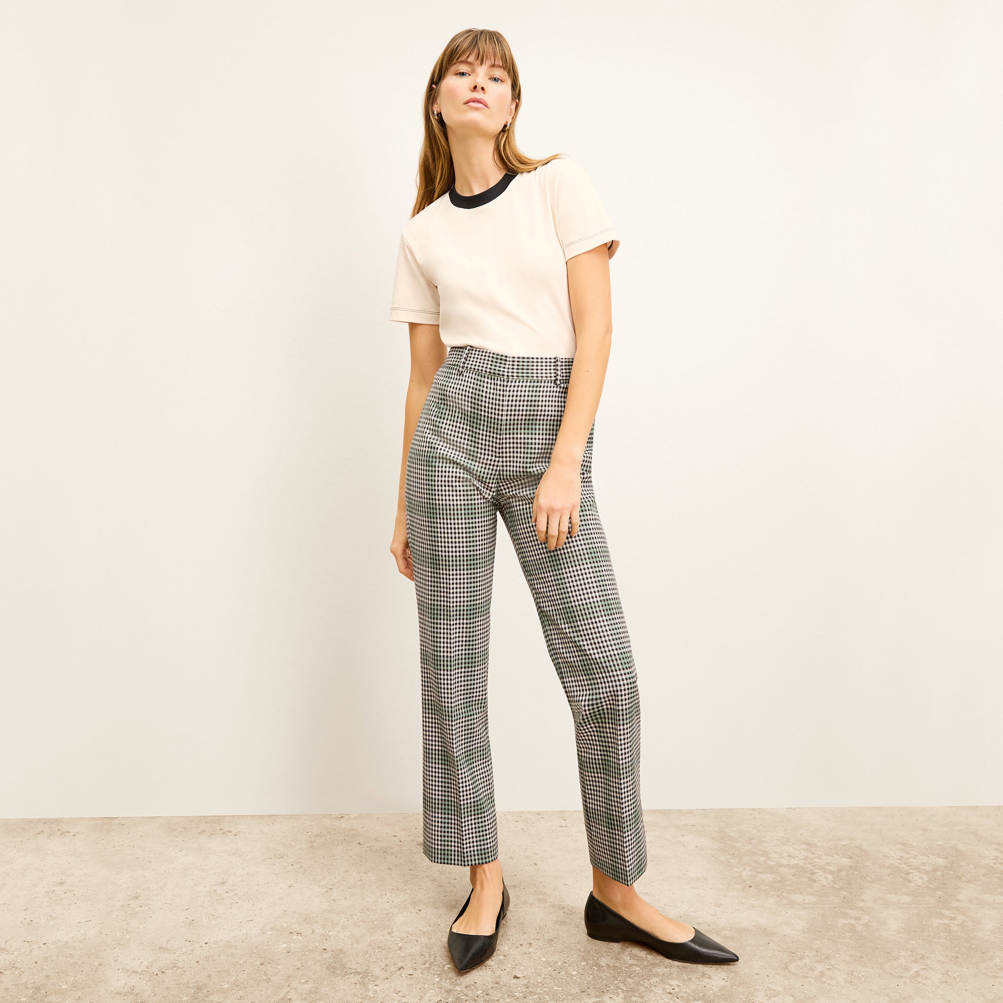 front image of a woman wearing the smith pant in check plaid 