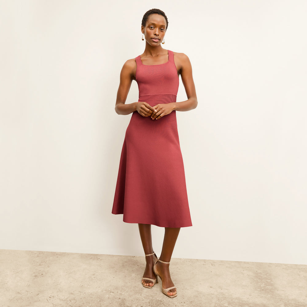 front image of a woman wearing the lottie dress in carnation