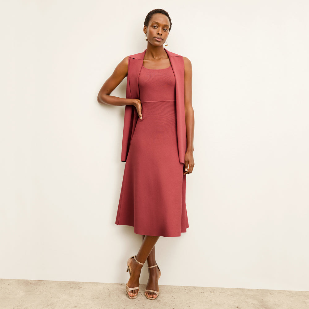 front image of a woman wearing the lottie dress in carnation