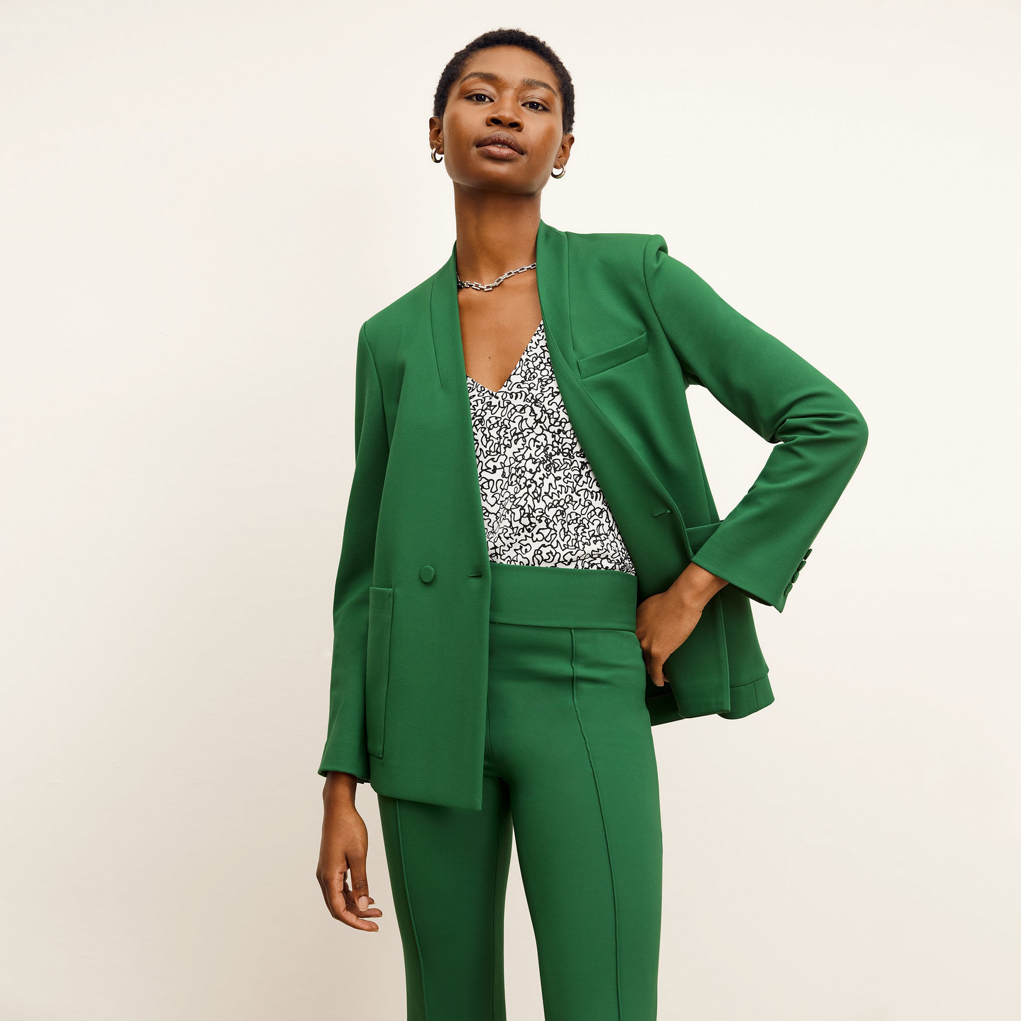 front image of a woman wearing the janette jacket in shamrock 