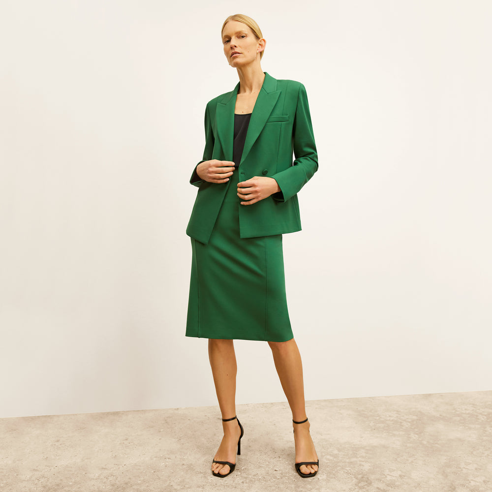 front image of a woman wearing the chantal skirt in shamrock