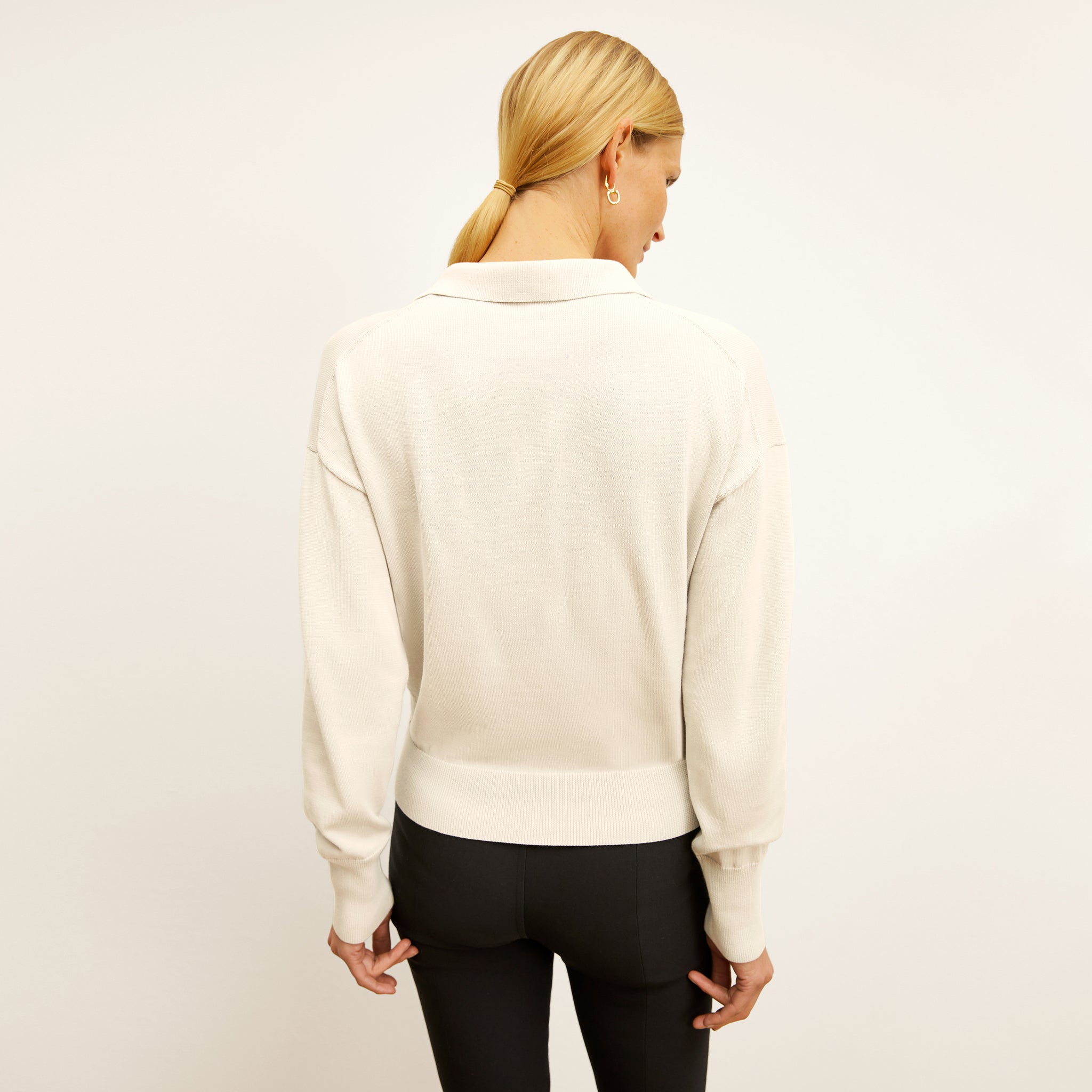 Bacl image of a woman wearing the Leo Pullover