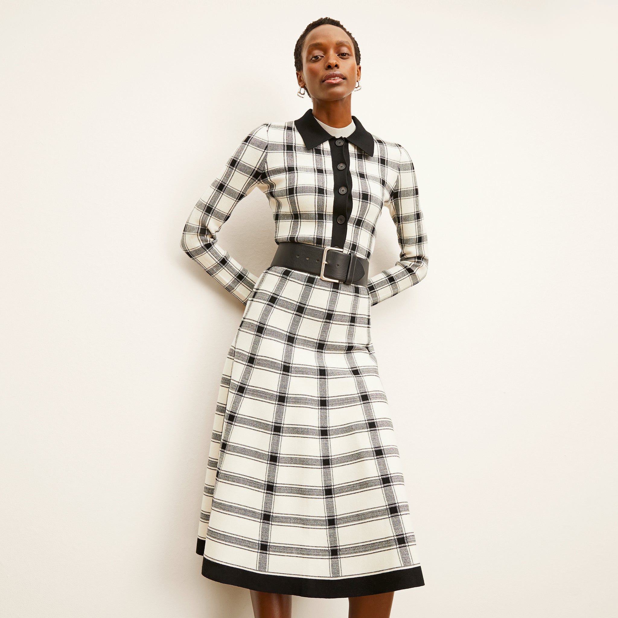 front image of a woman wearing the marlowe skirt in bold check