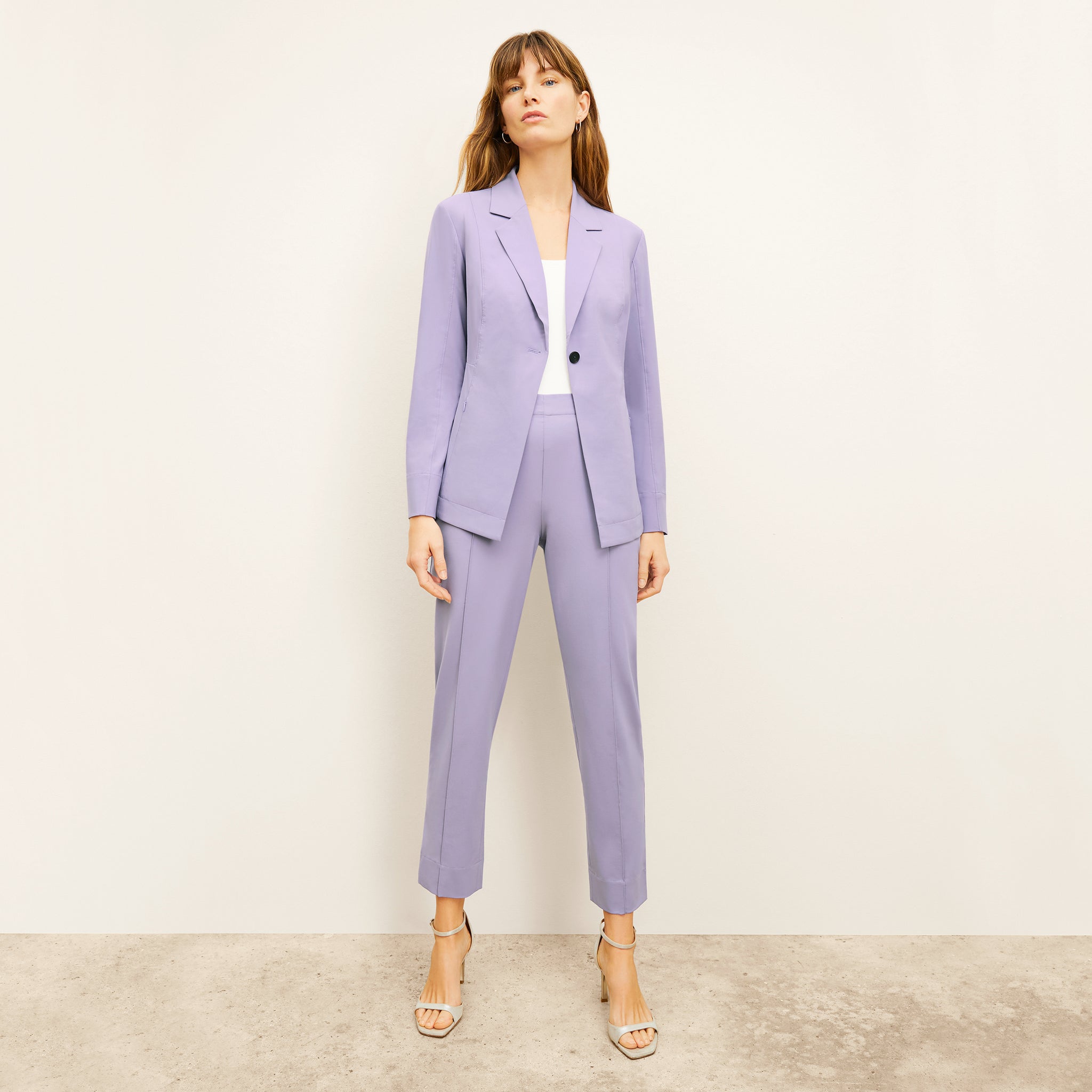 front image of a woman wearing the colby pants in light orchid