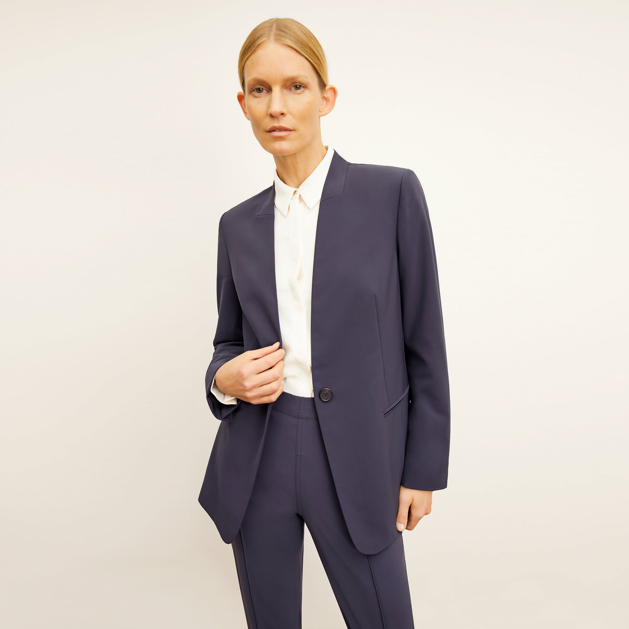 Front image of a woman wearing the Twidwell Blazer