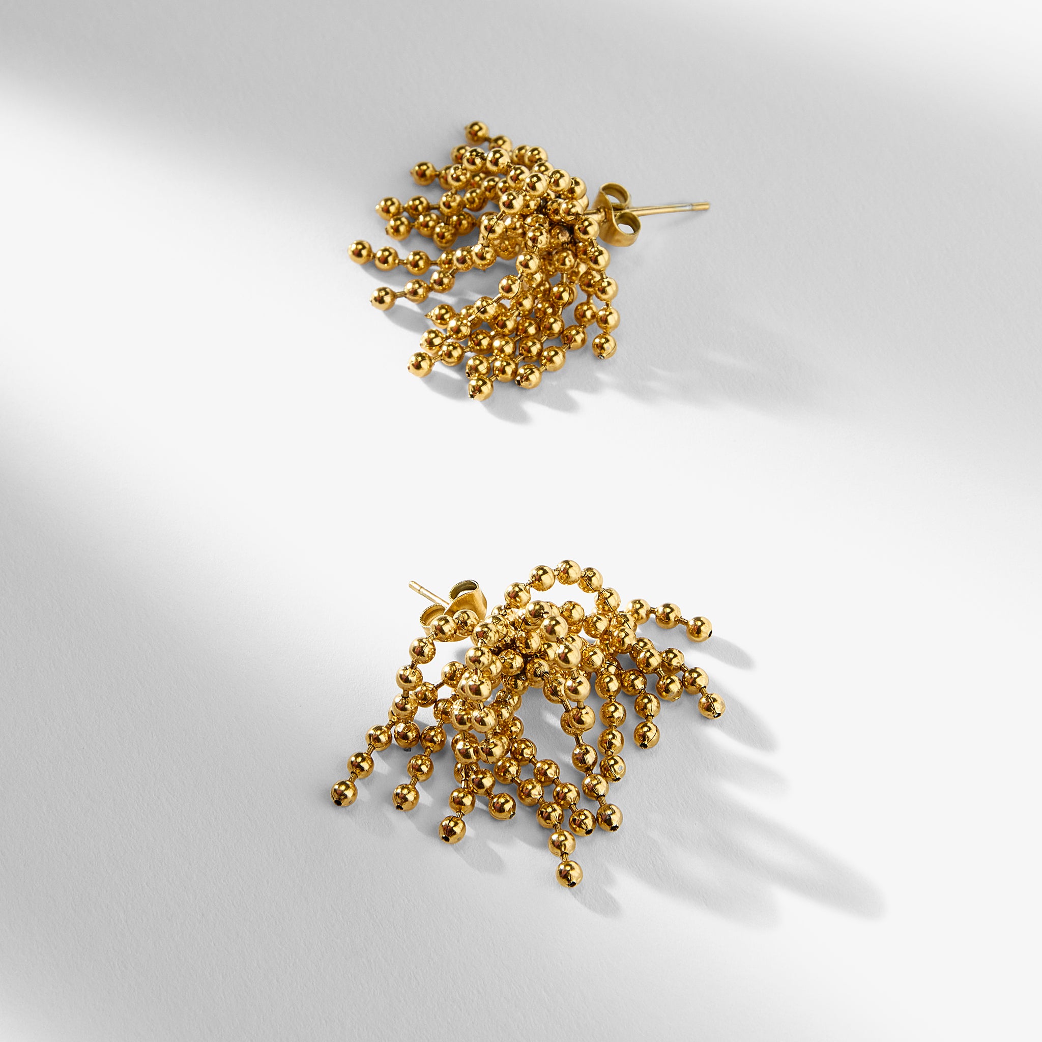 packshot image of the elsie earrings in gold