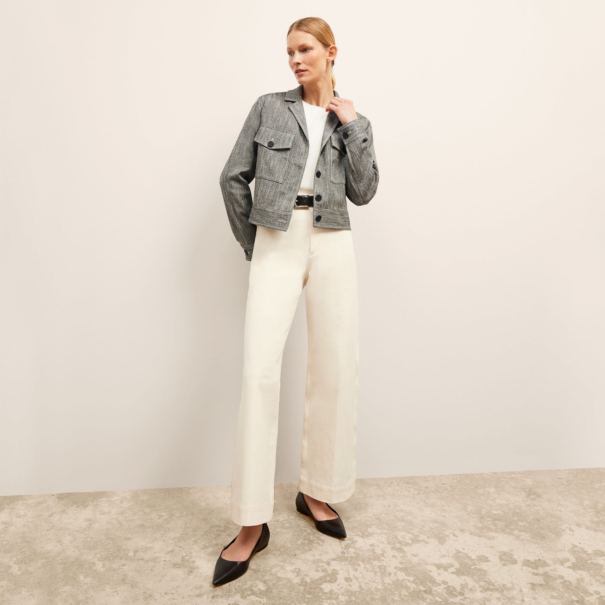 Front image of a woman wearing the Milo Jean in Tusk