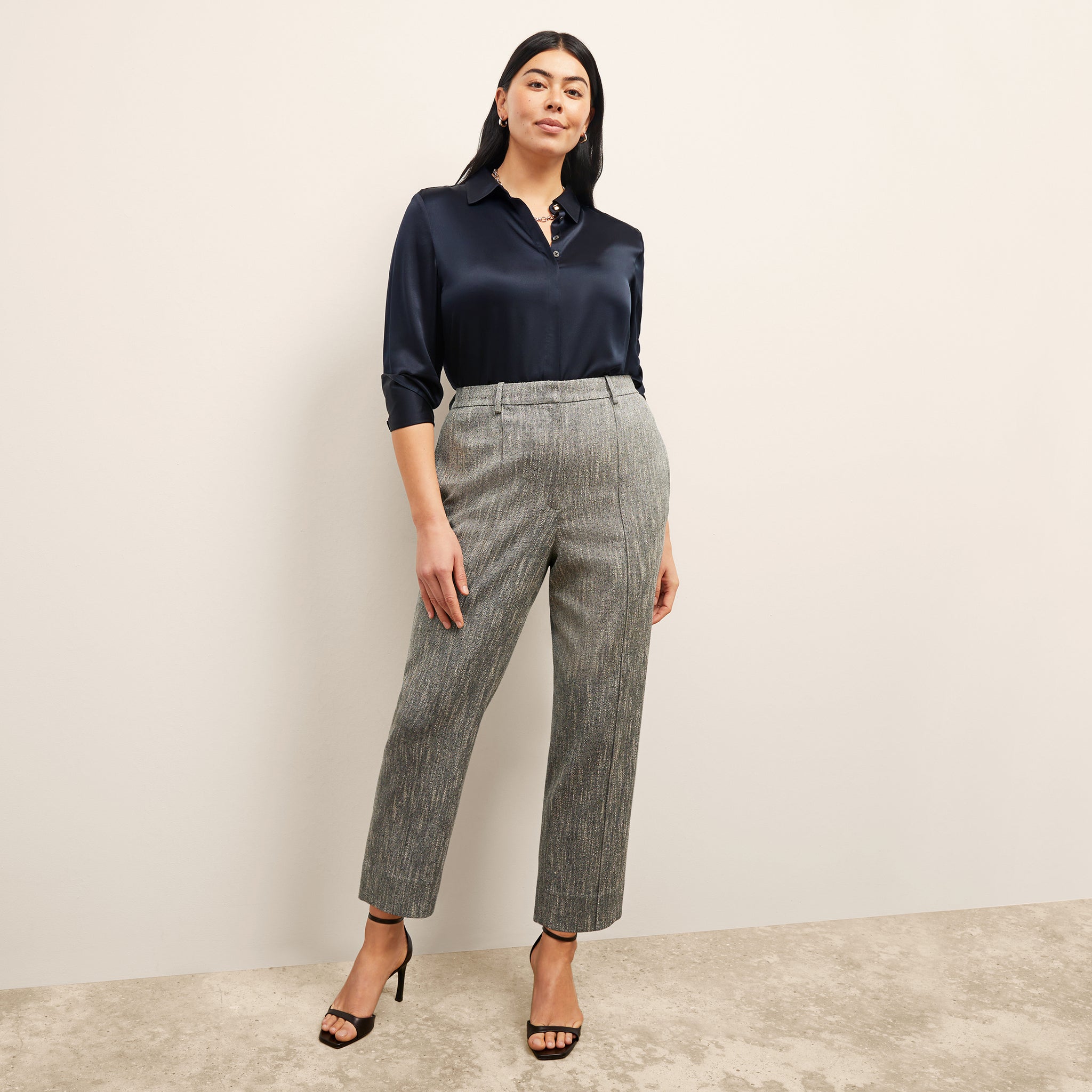 front image of a woman wearing the pearl pant in black/ivory
