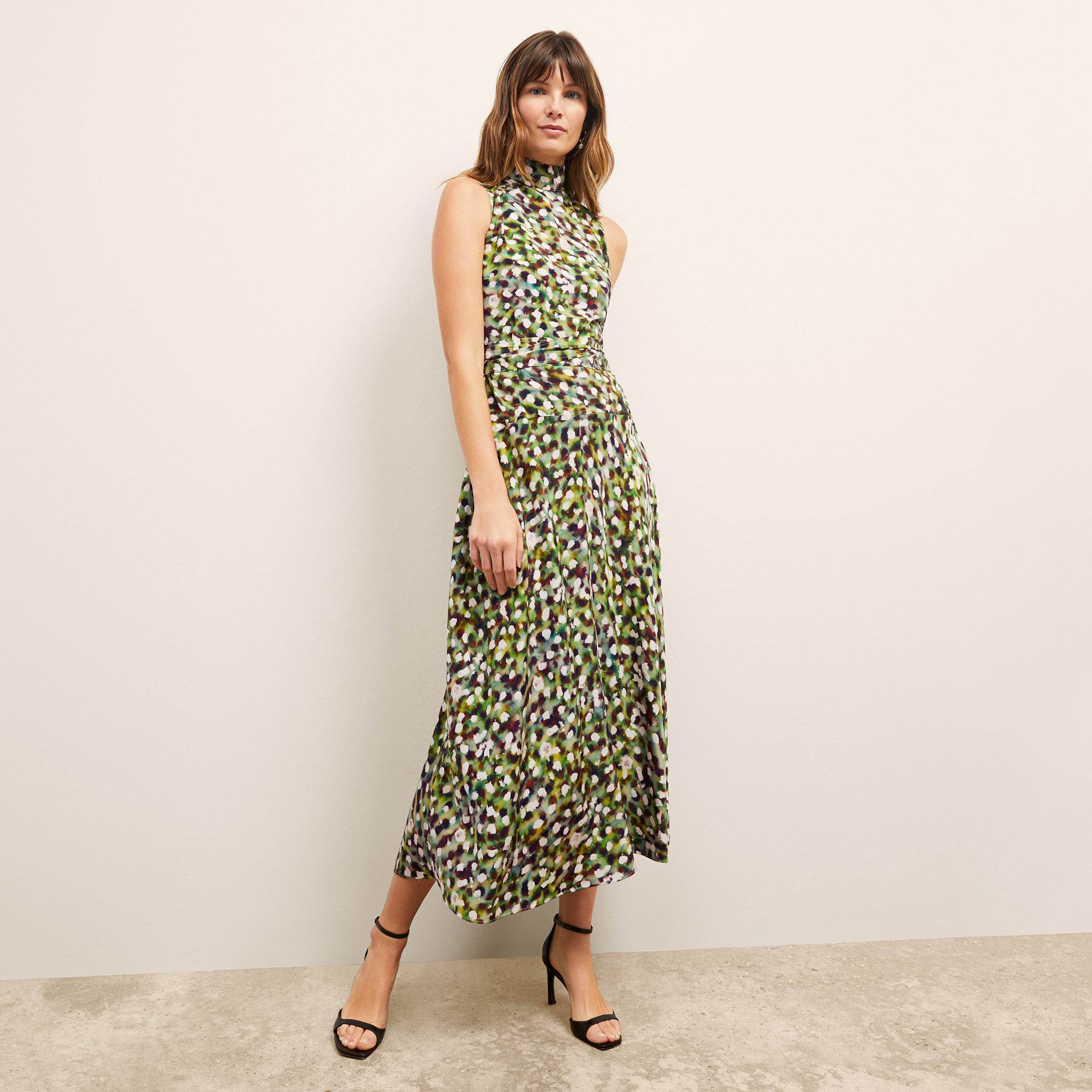 front image of a woman wearing the martina dress in spotlight print 